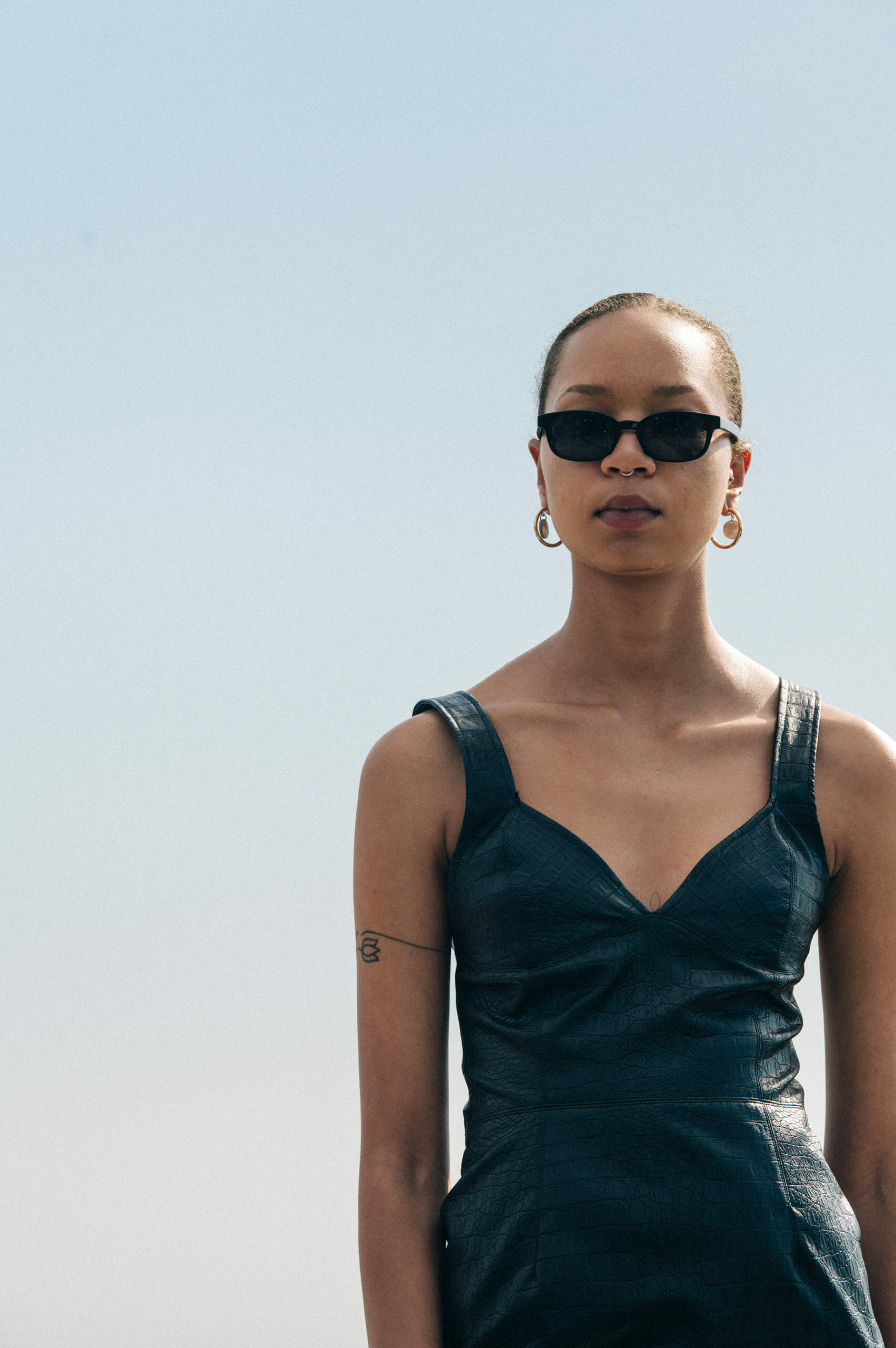 Model wearing black Soulland outfit