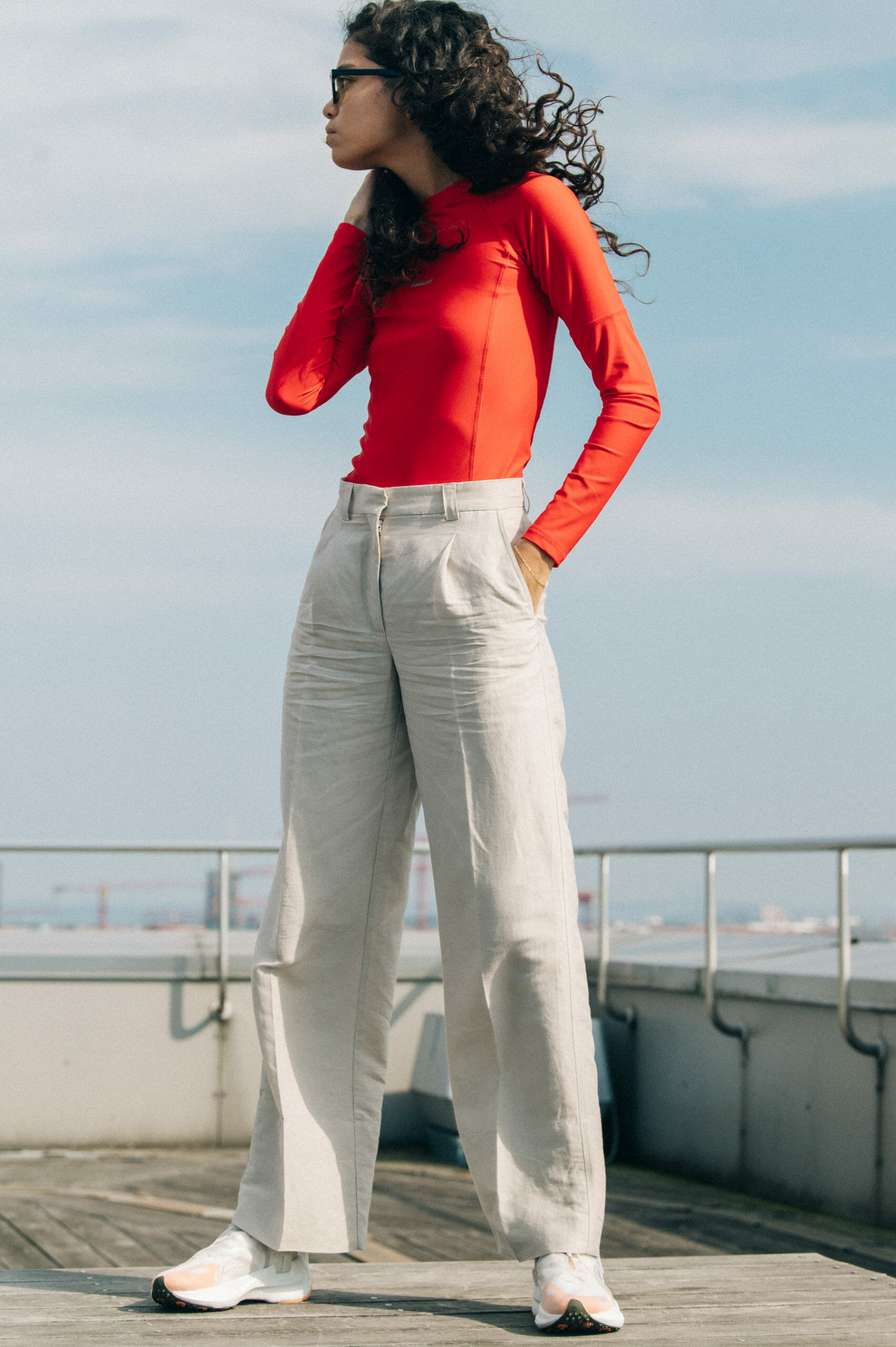 Model wearing red Soulland clothing