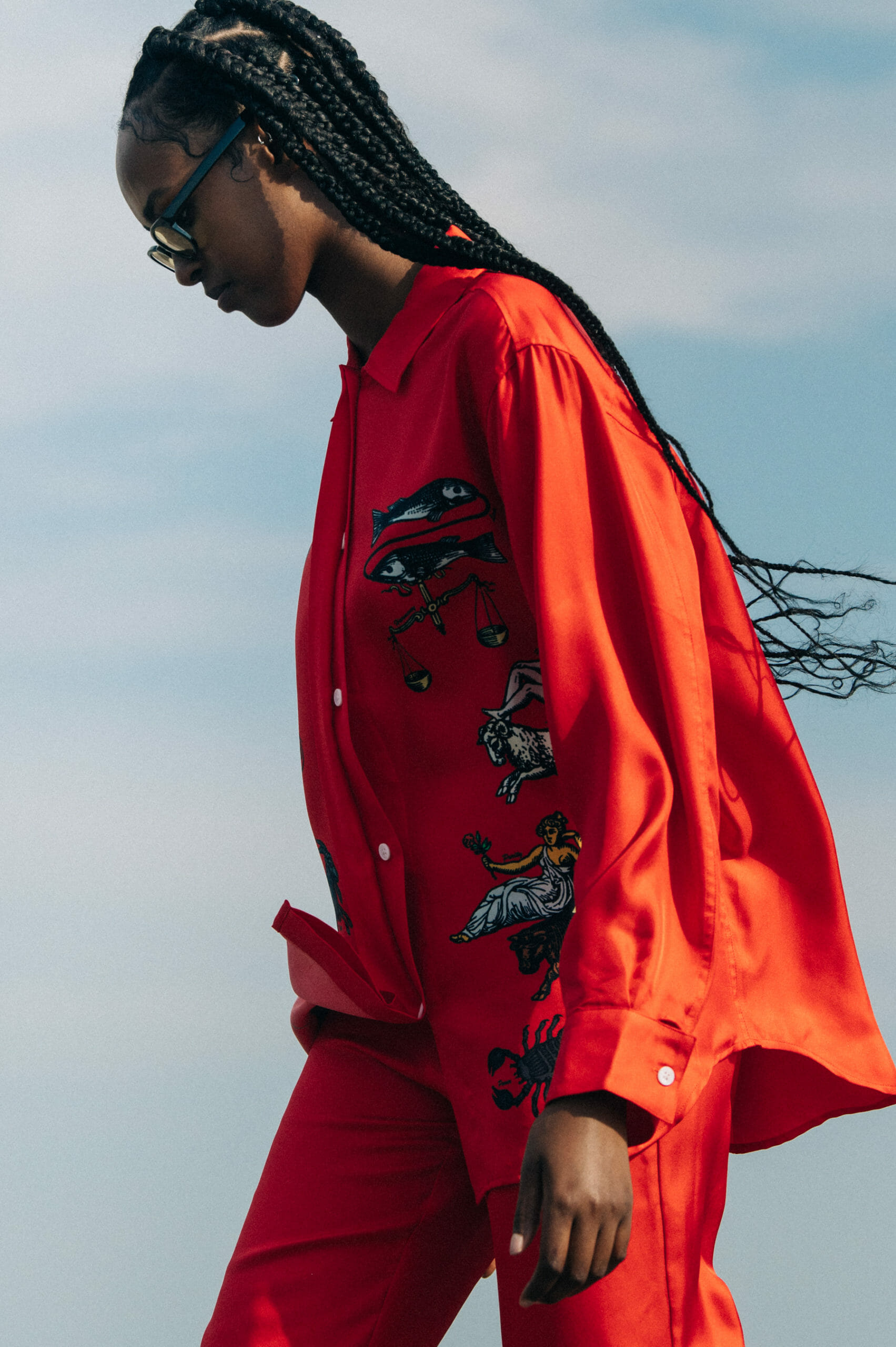 Model wearing red Soulland clothing