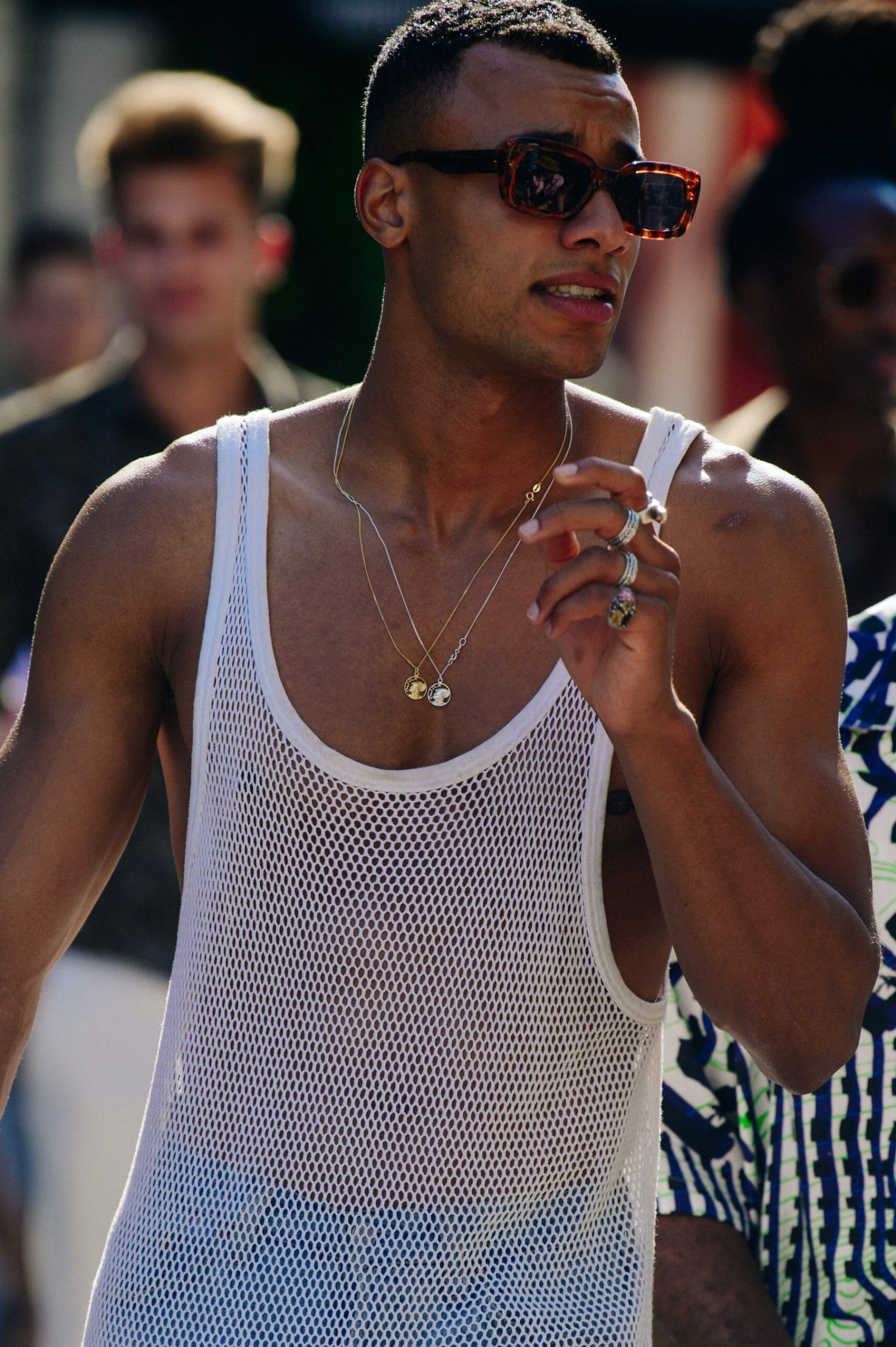 Man wearing string vest