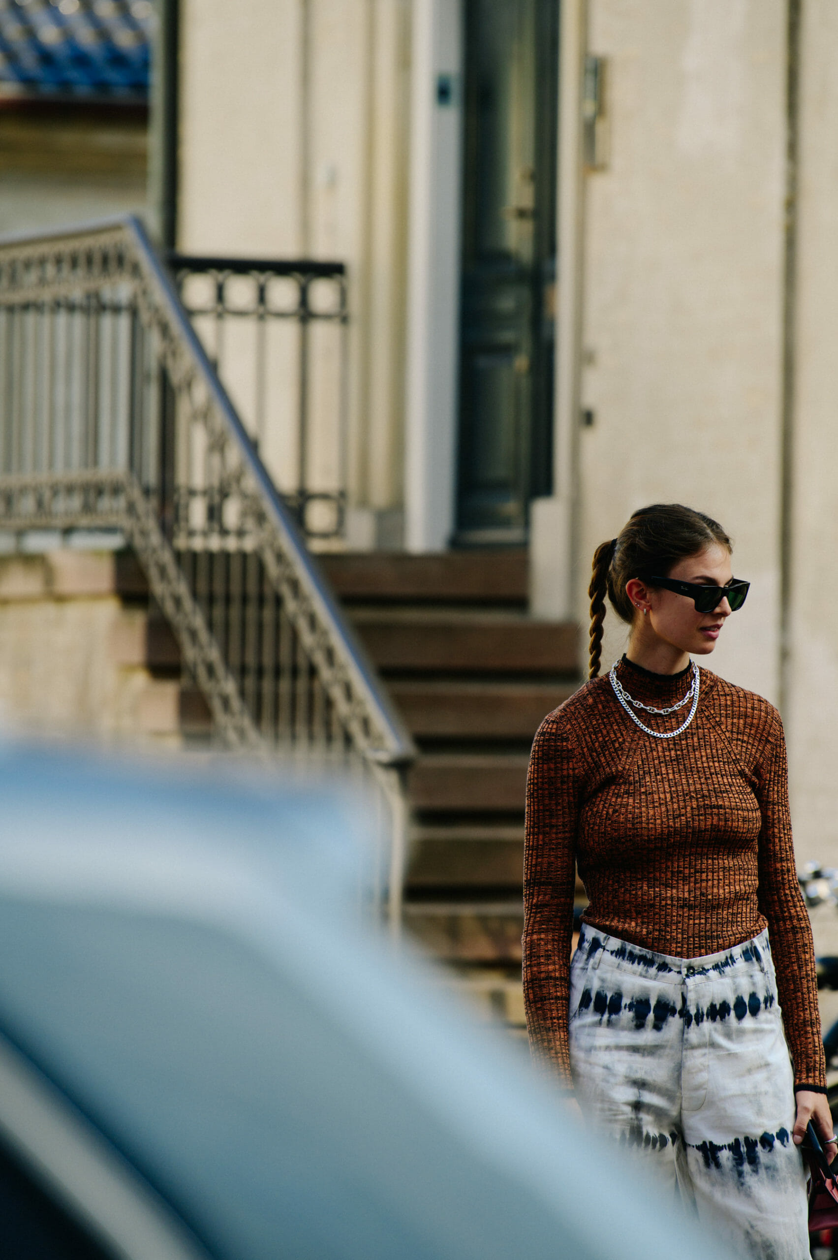 Woman wearing brown jumper