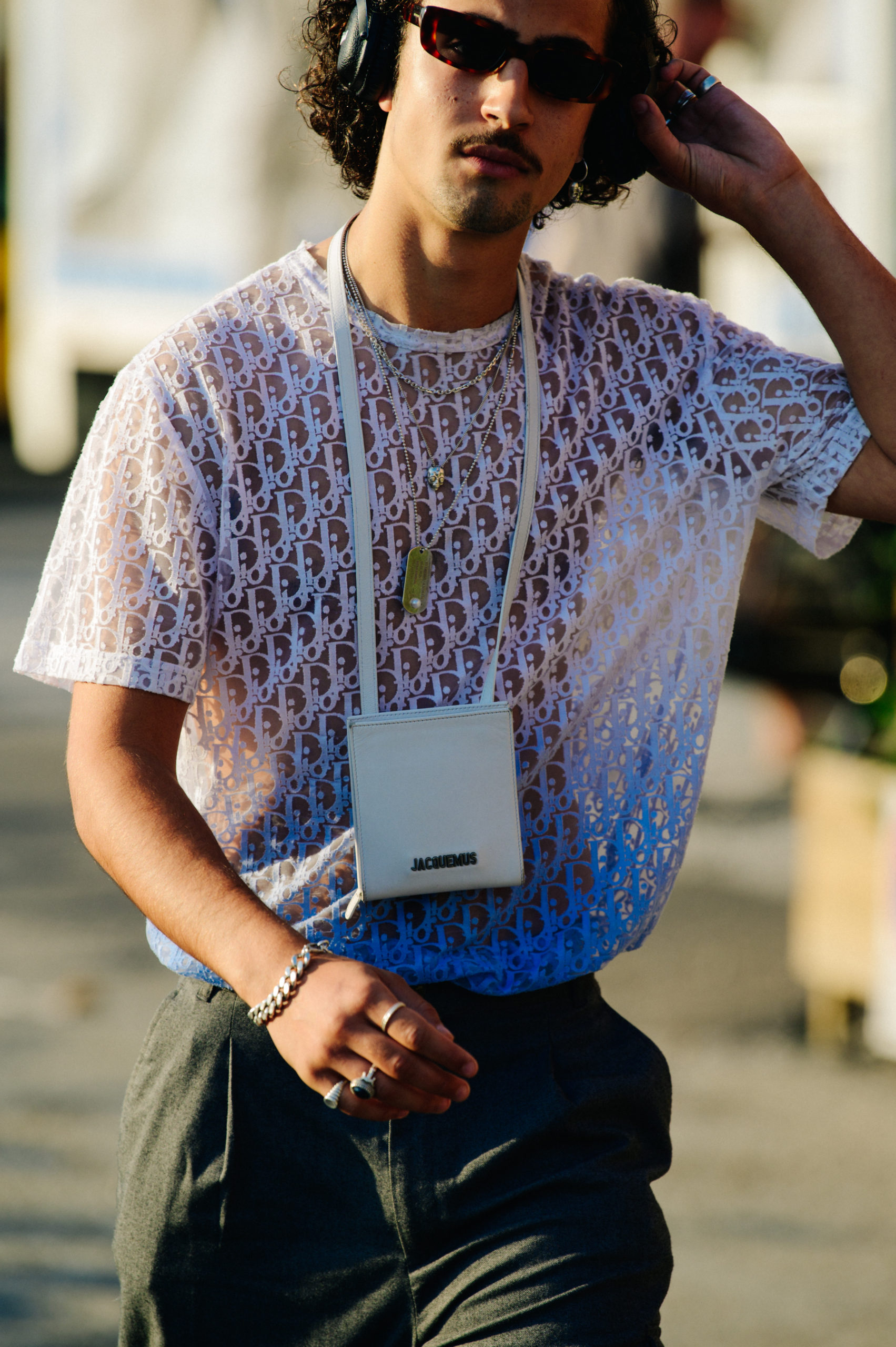 Man wearing Christian Dior shirt