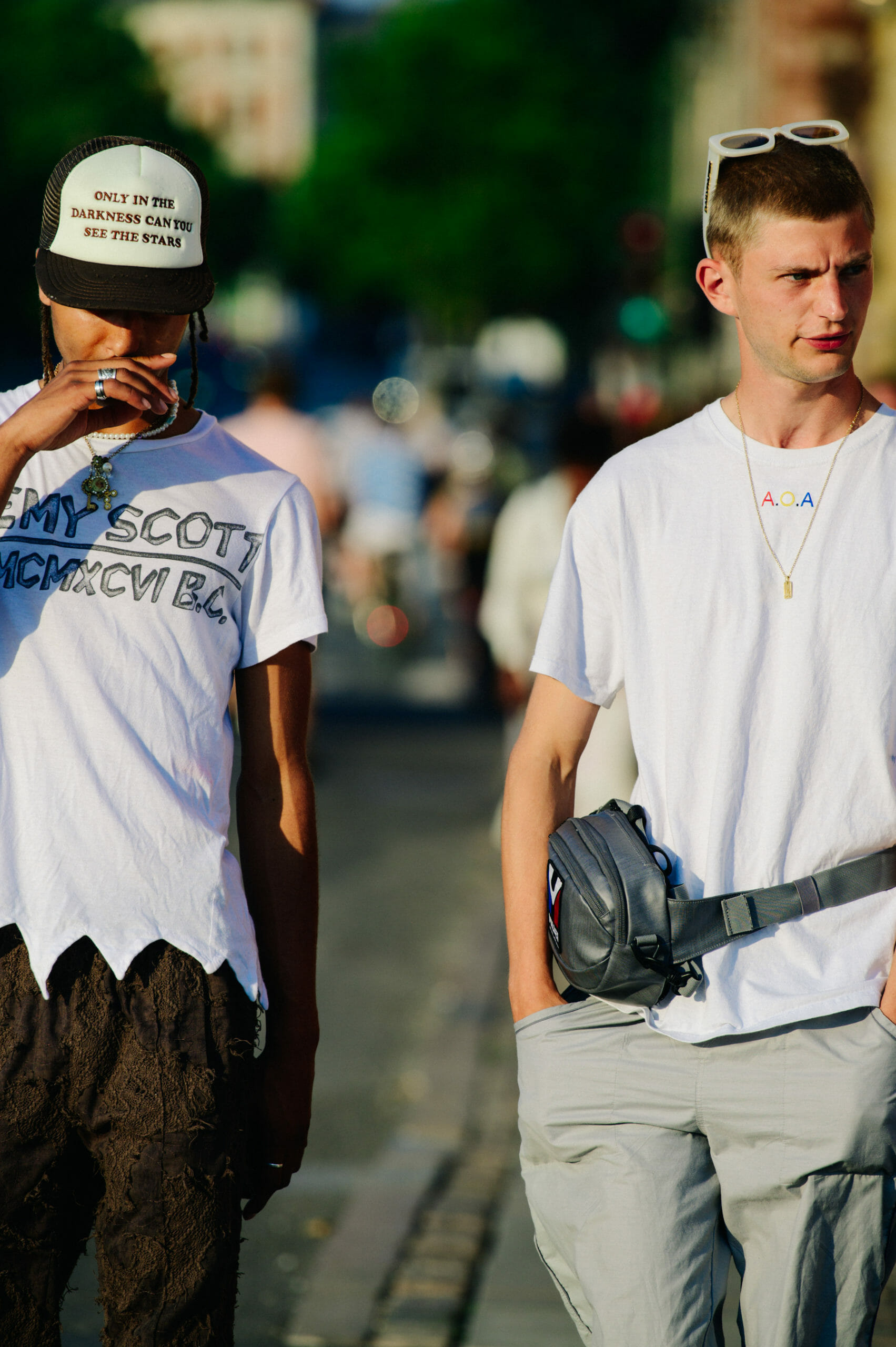 Two men wearing white tee shirts