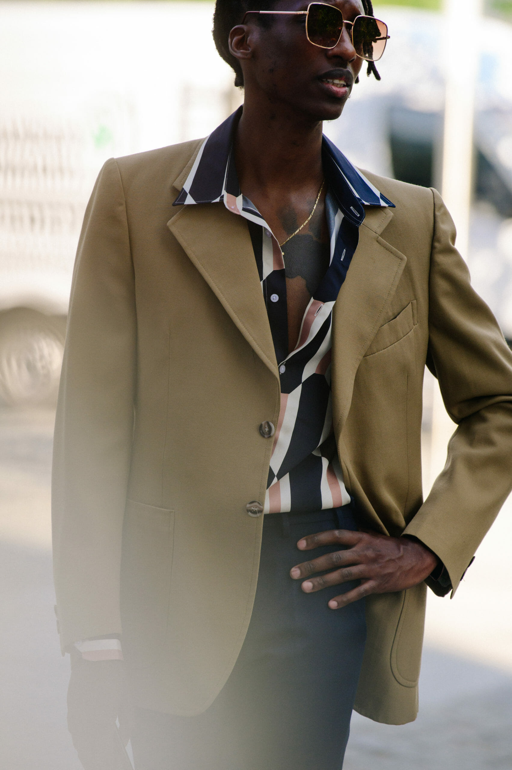 Man wearing tan blazer