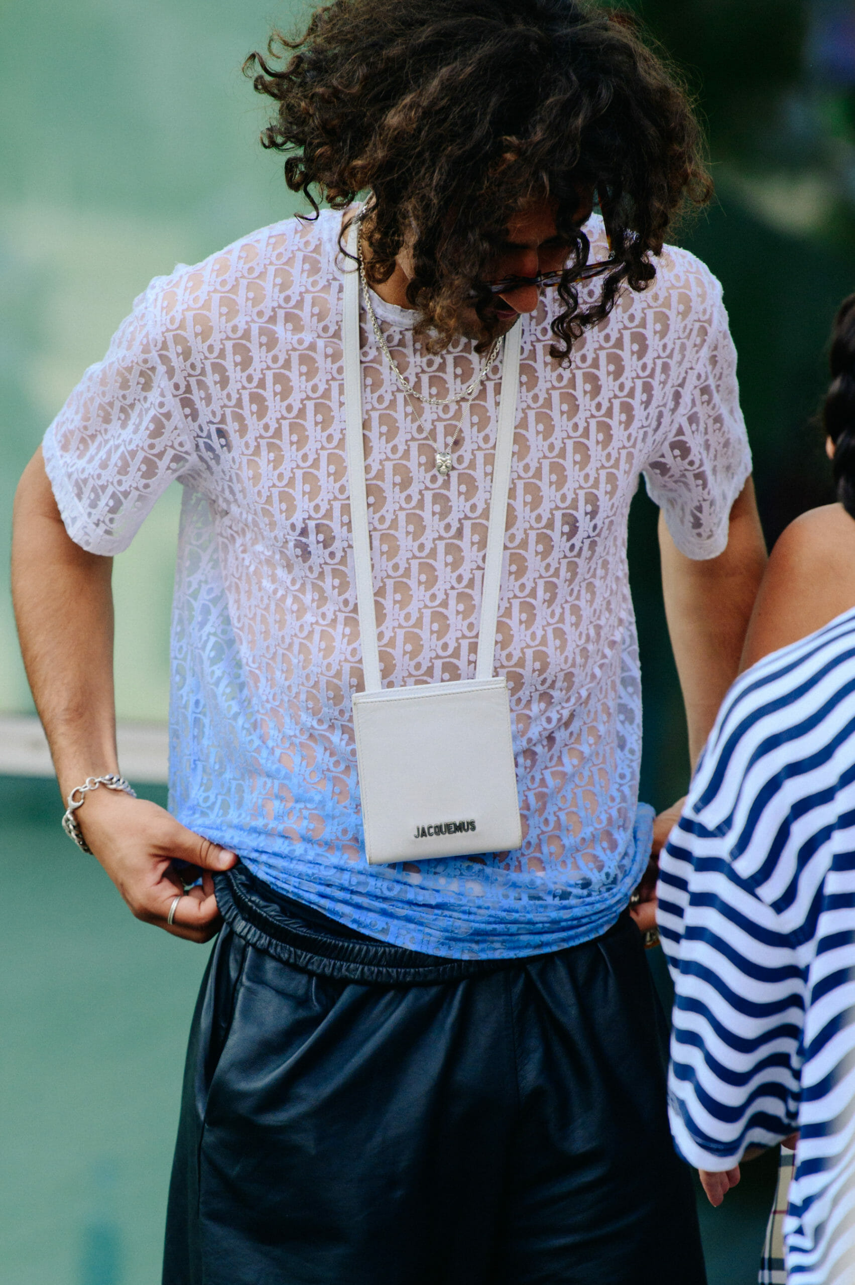 Man wearing Christian Dior top