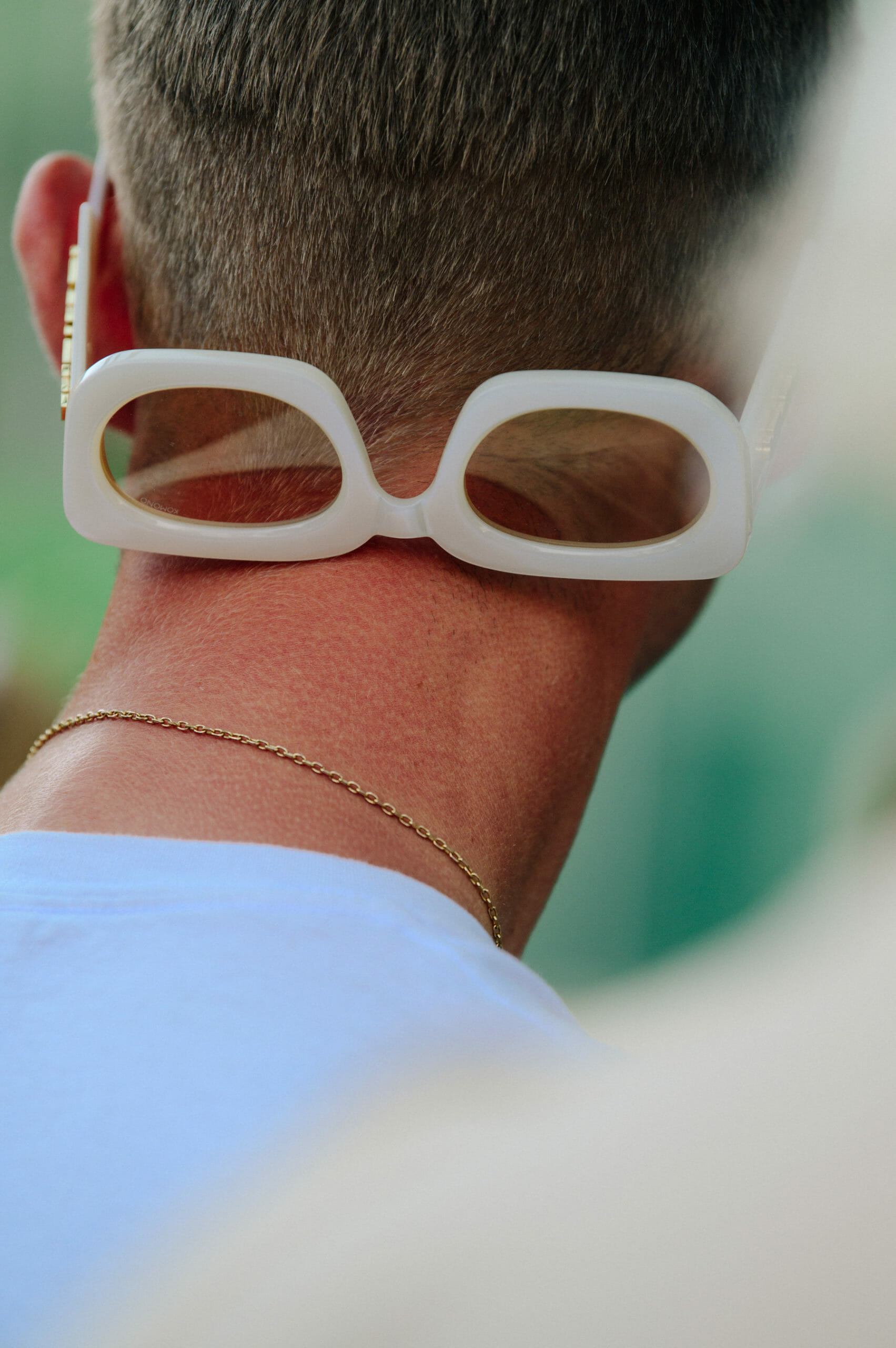 Man wearing white glasses