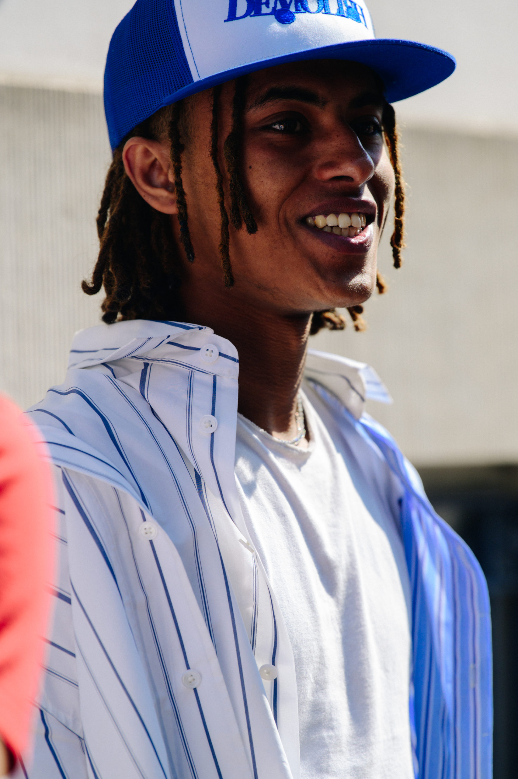 Man wearing blue cap