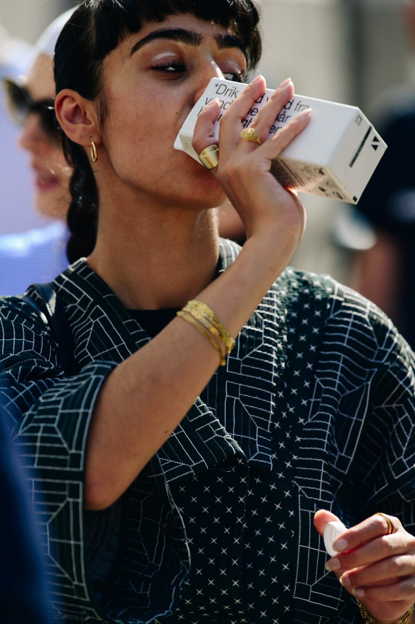 Woman drinking box water