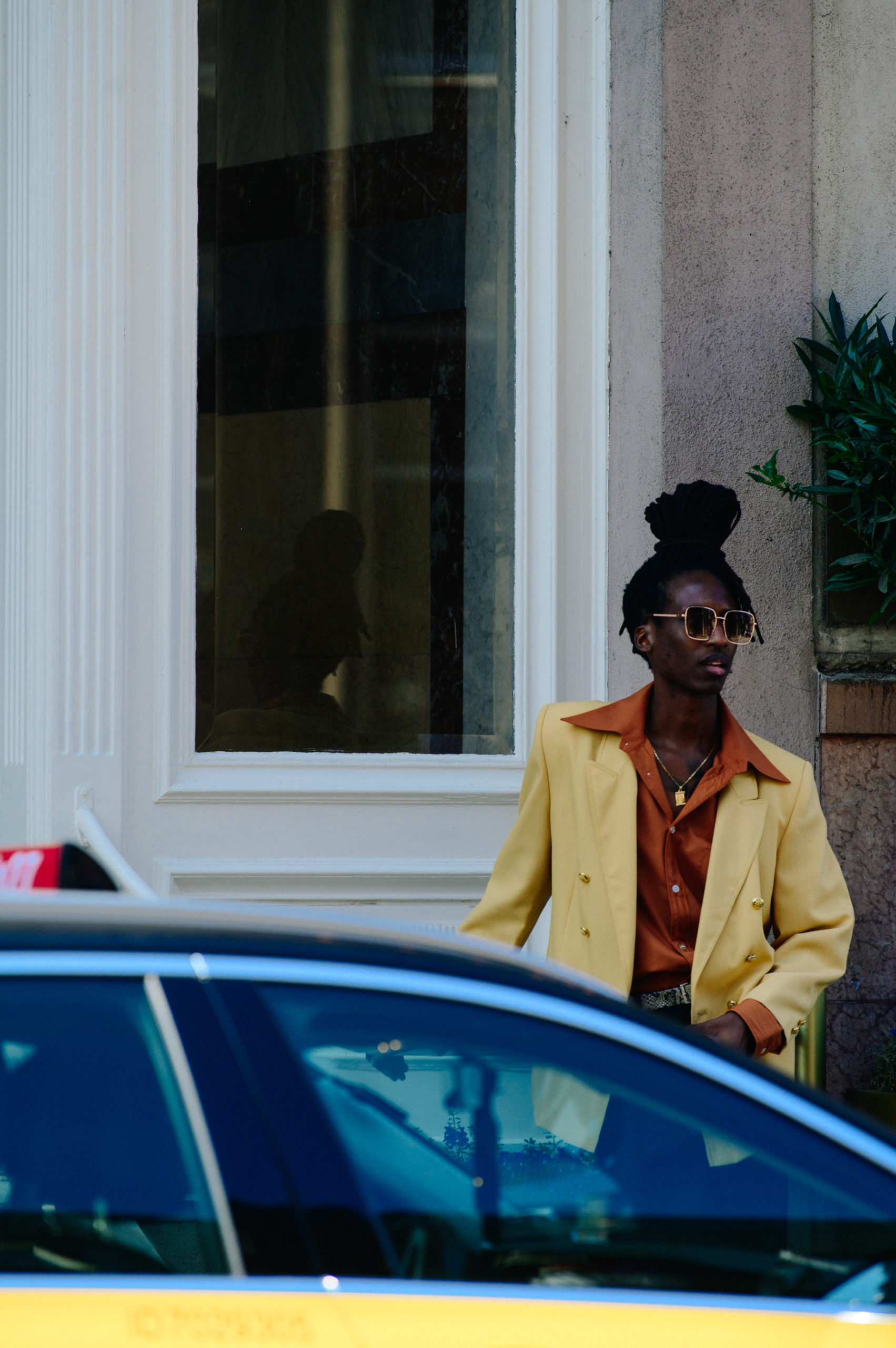 Man wearing yellow suit