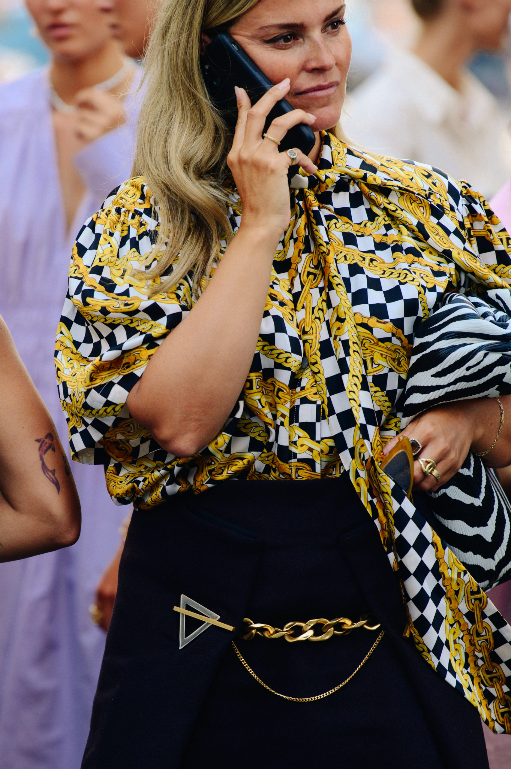 Woman wearing gold shirt