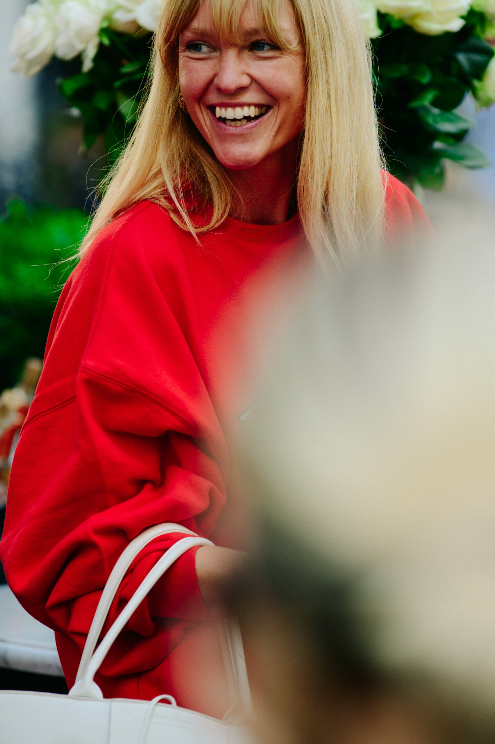 Woman wearing red jumper