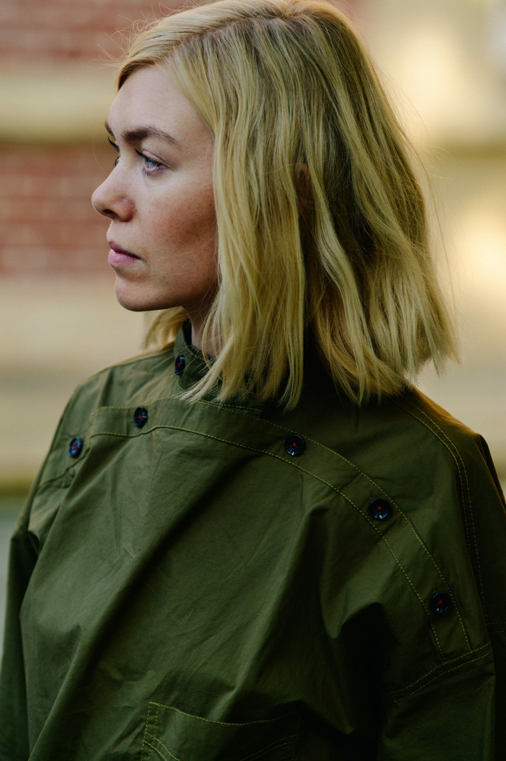 Woman wearing green jacket