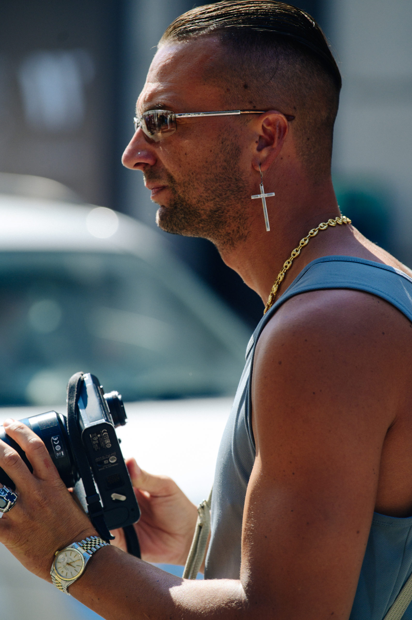 French man wearing gold cross