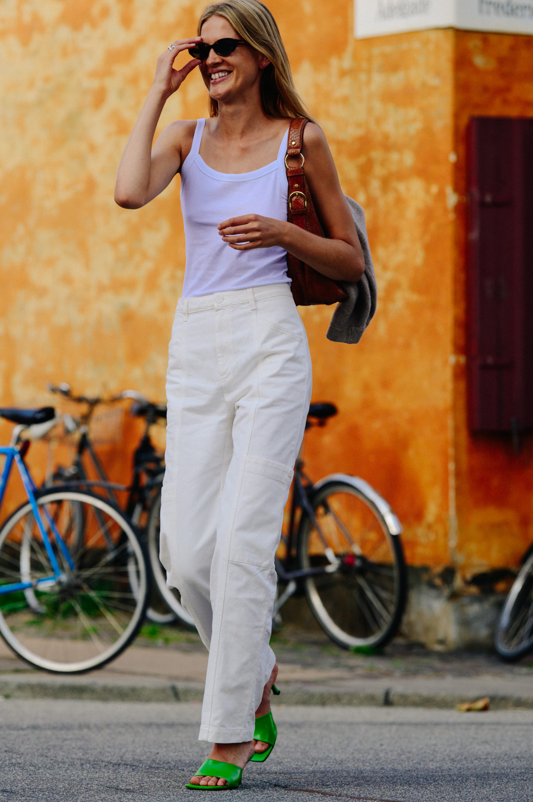 Model wearing white vest
