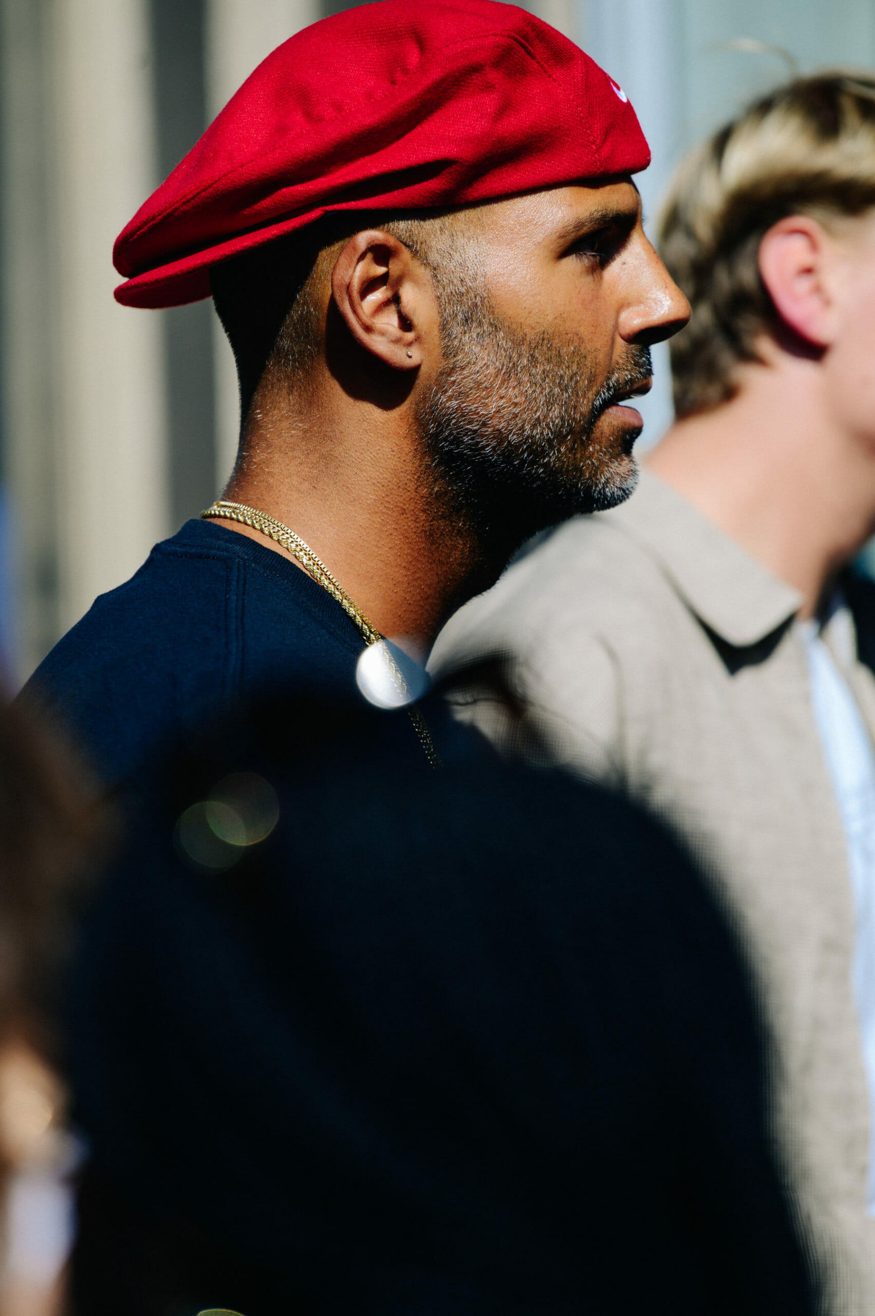 Man wearing red Kangol hat