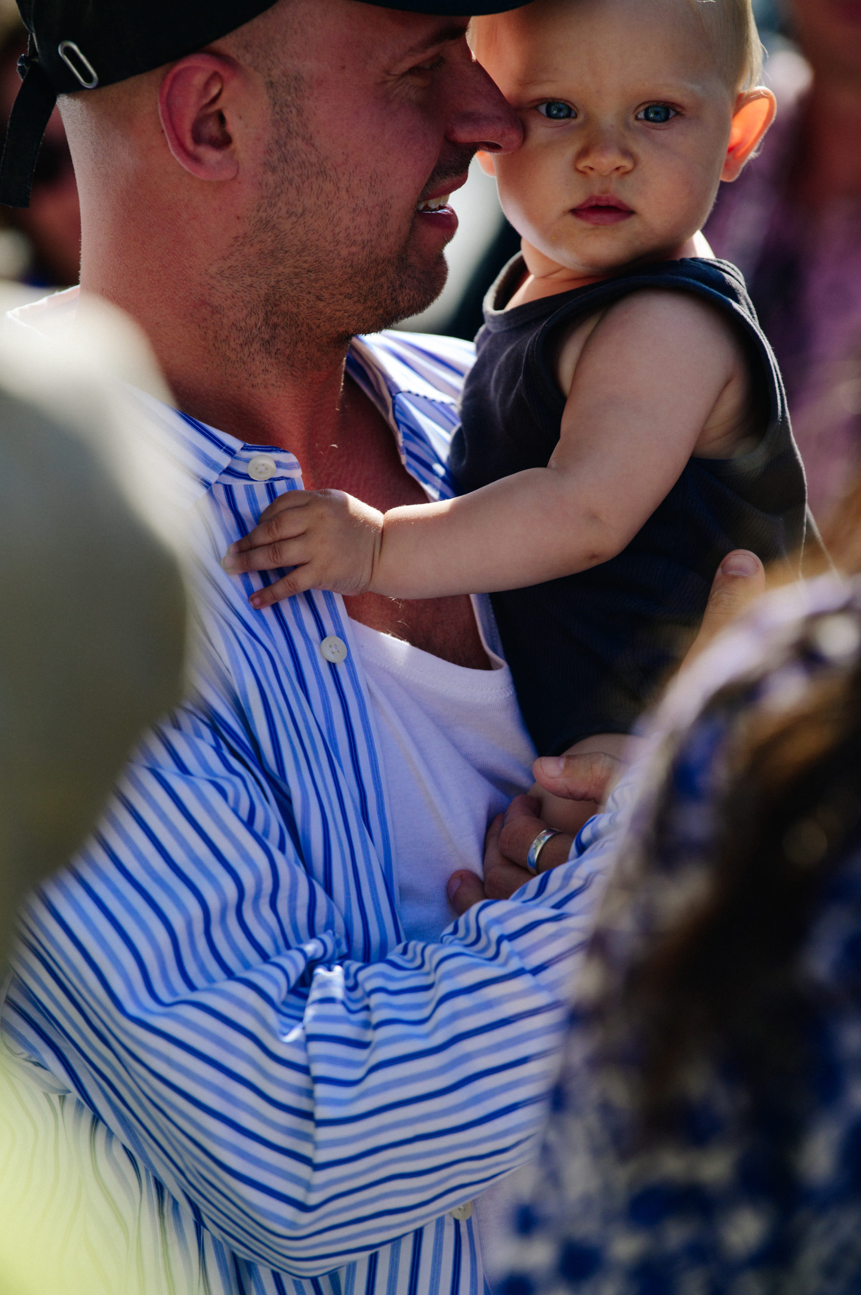 Man carrying baby