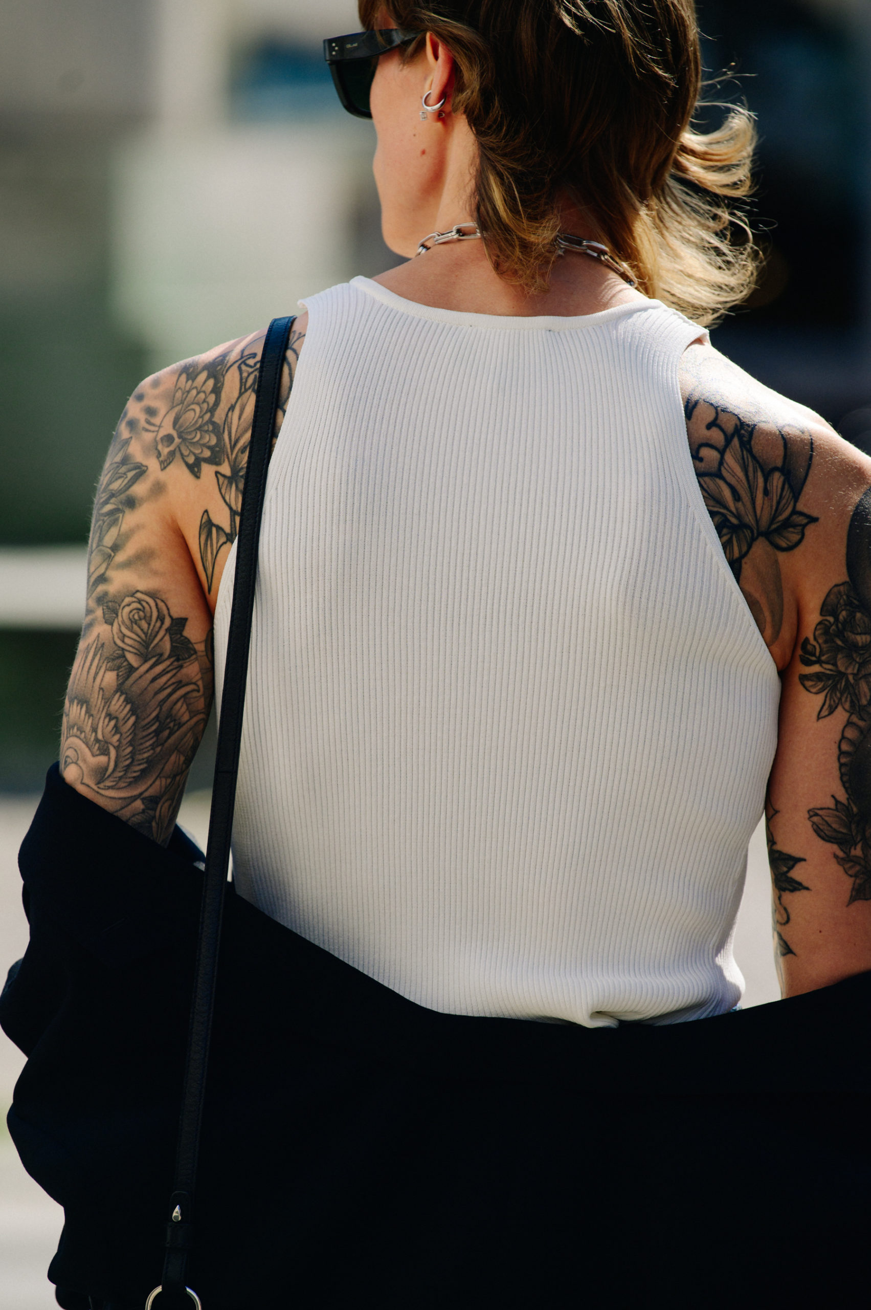 Man wearing white vest