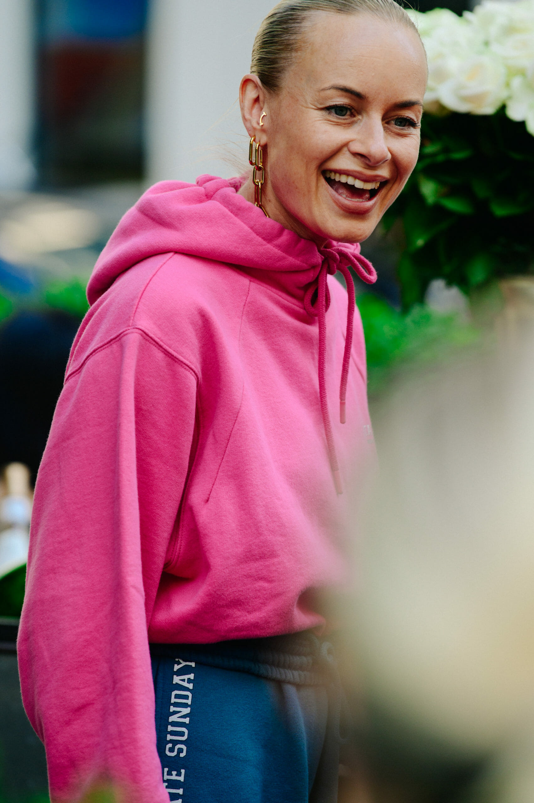 Woman wearing pink hoodie