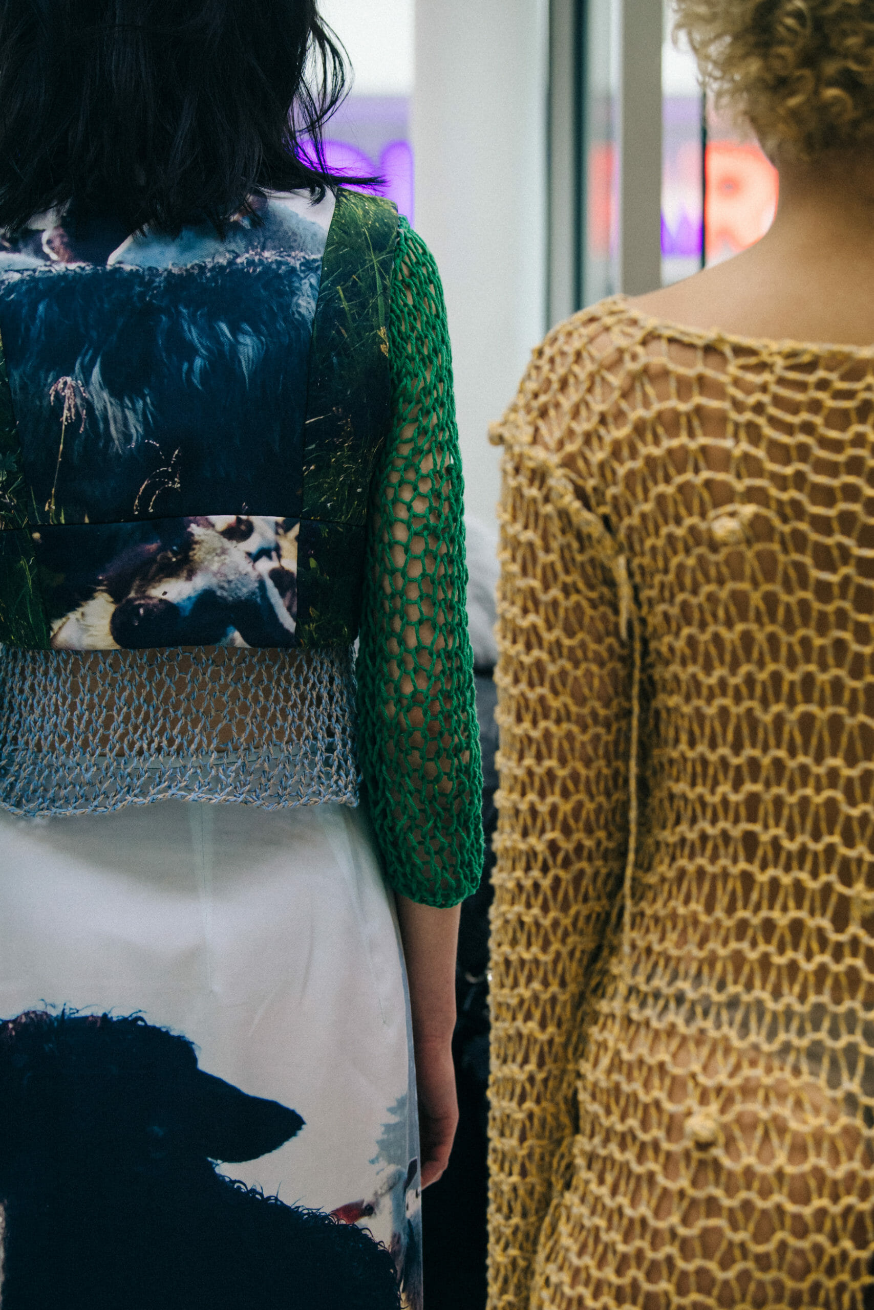 Model wearing net dress
