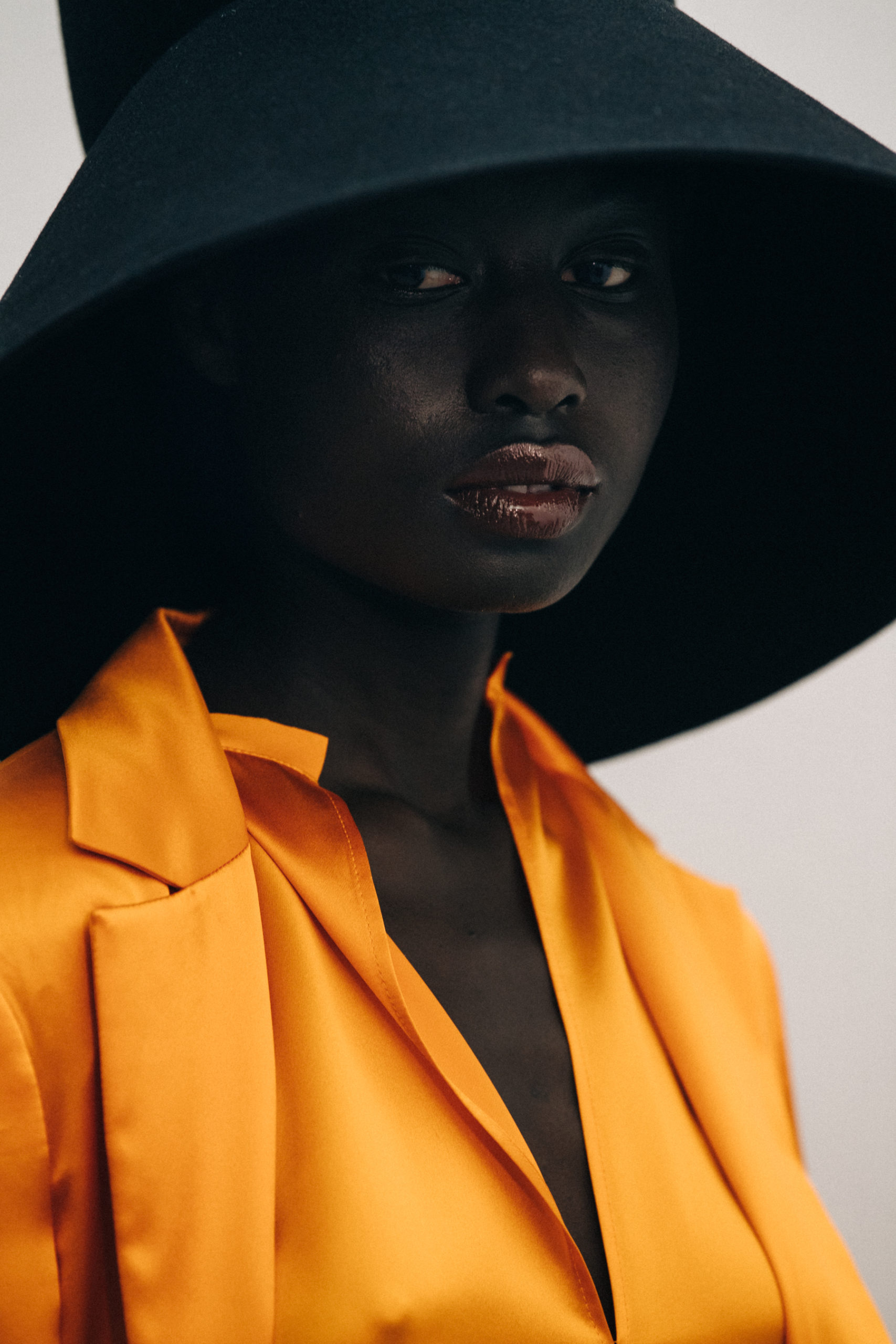 Model wearing large hat at Nina Ricci