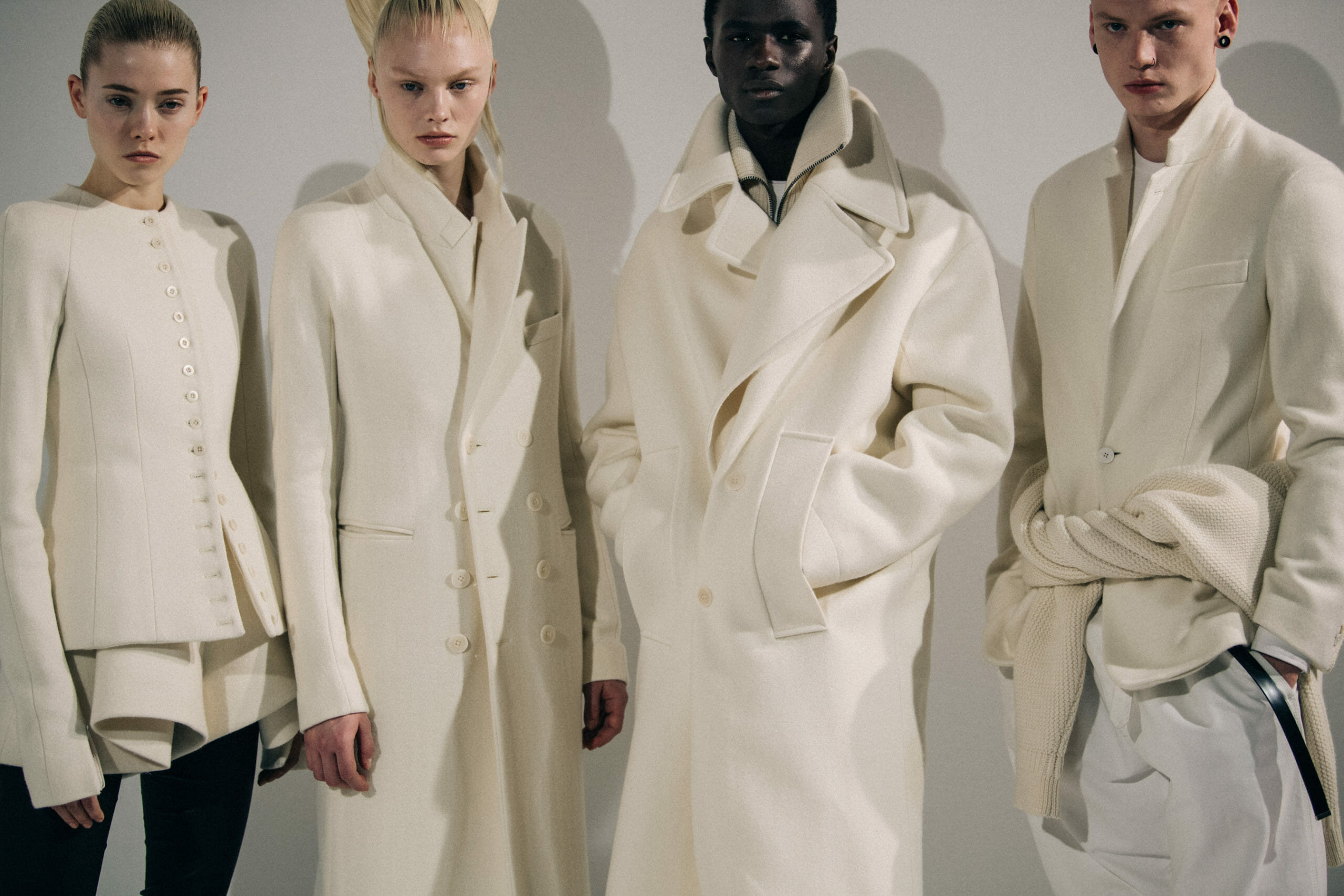 Model wearing white Haider Ackermann coat