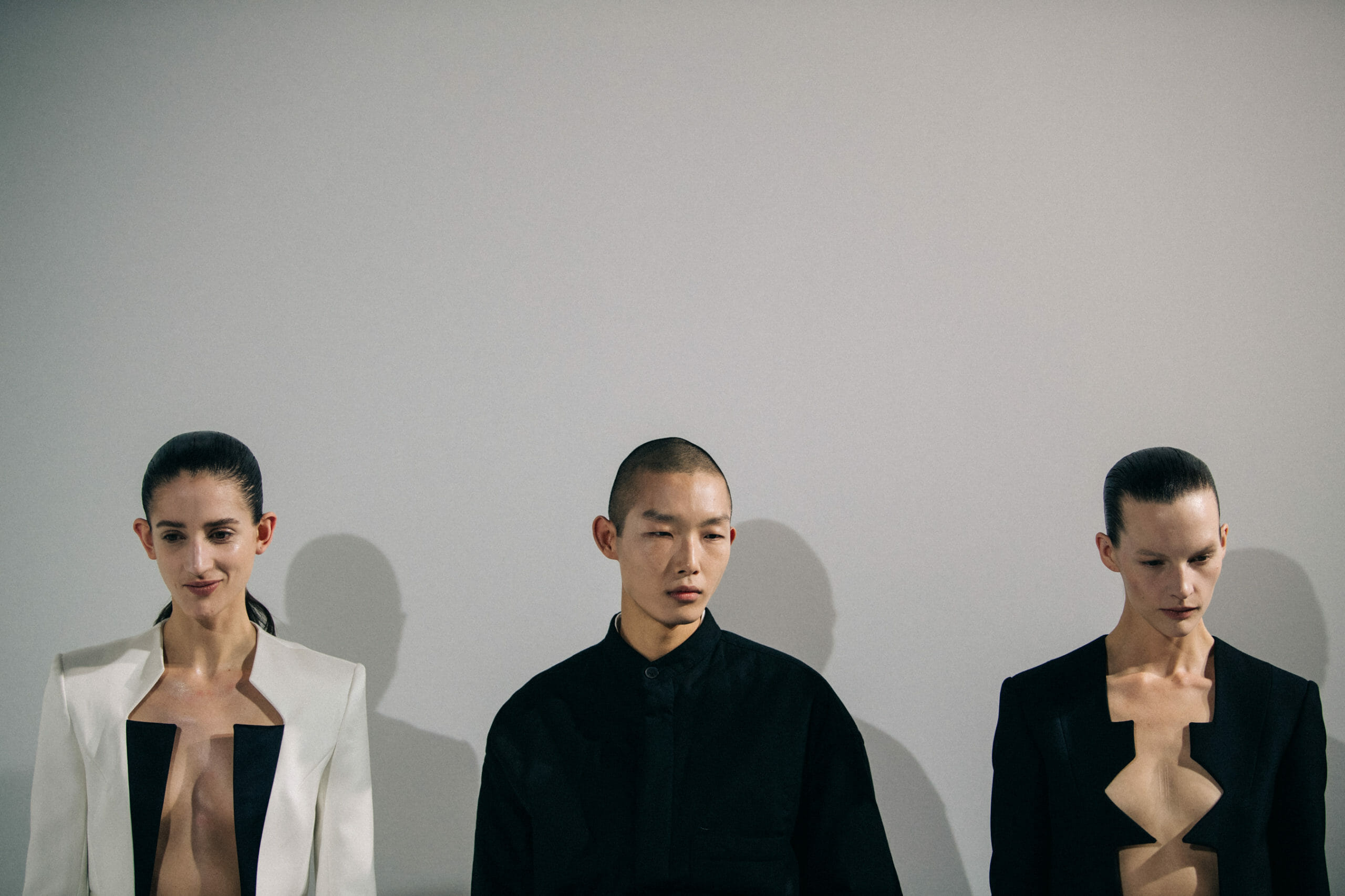 Models wearing black and white at Haider Ackermann