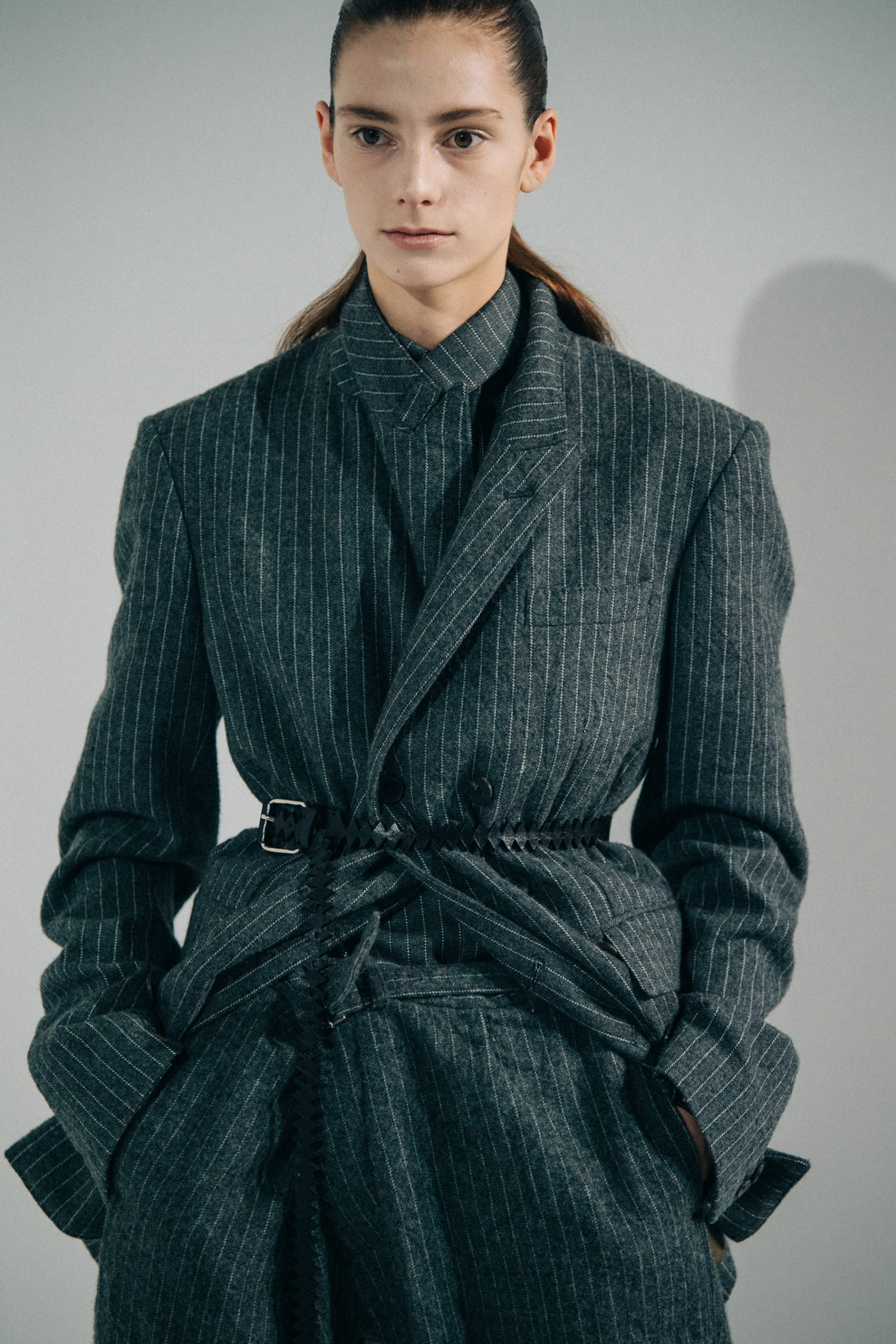 Models wearing black and grey at Haider Ackermann