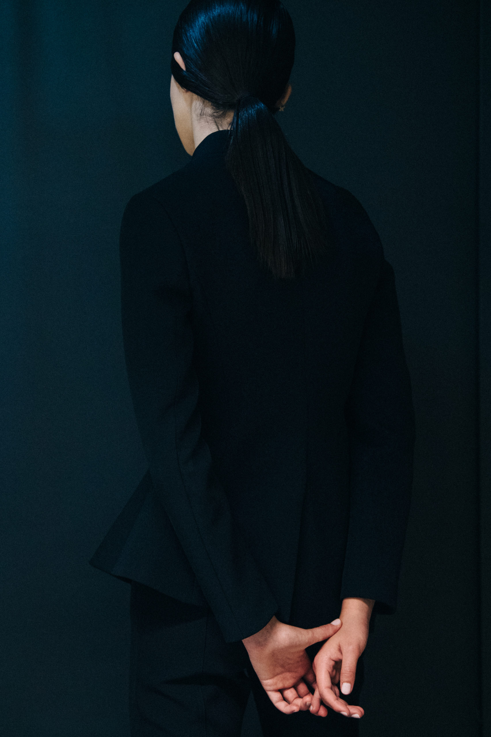 Models wearing dark Coperni outfit