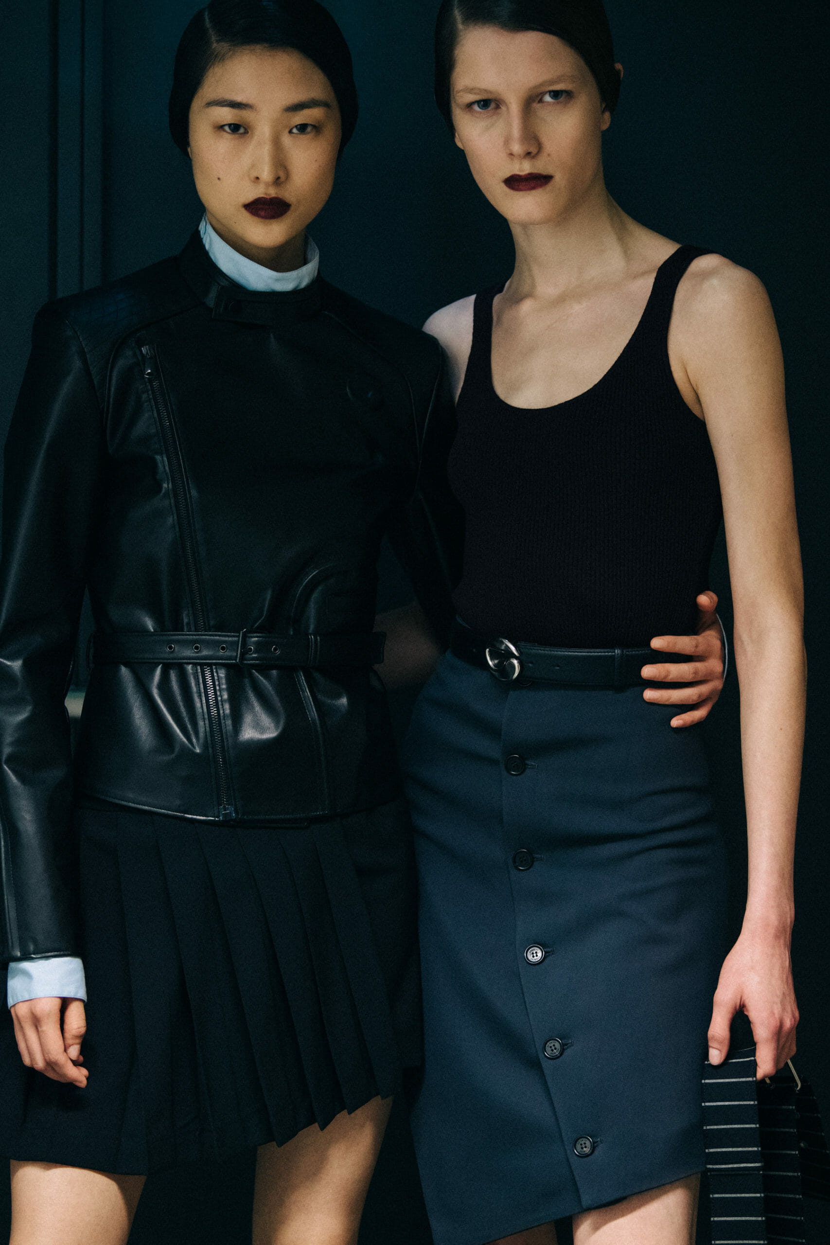 Models wearing dark Coperni outfit