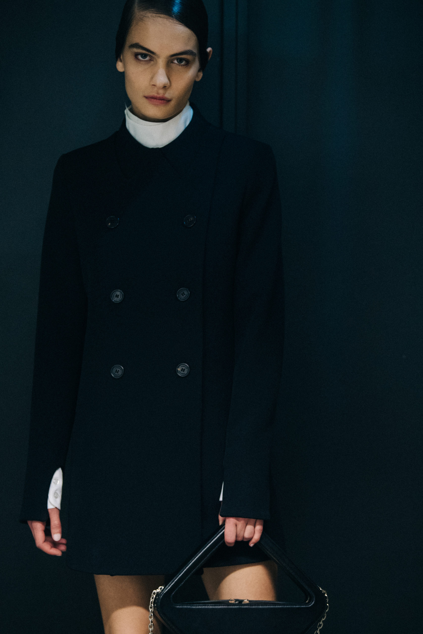 Models wearing dark Coperni outfit