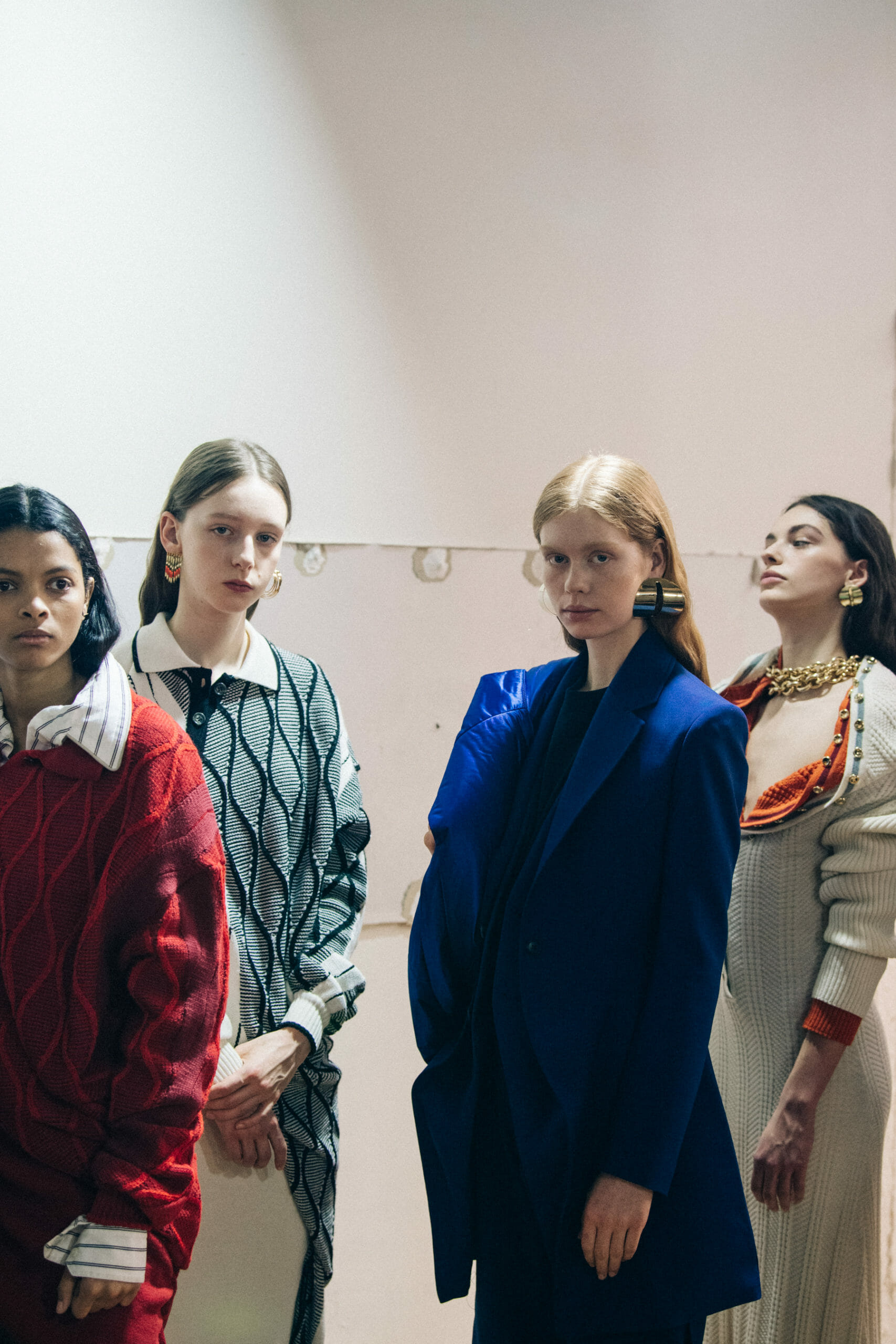 Models wearing colourful outfits at Y Project