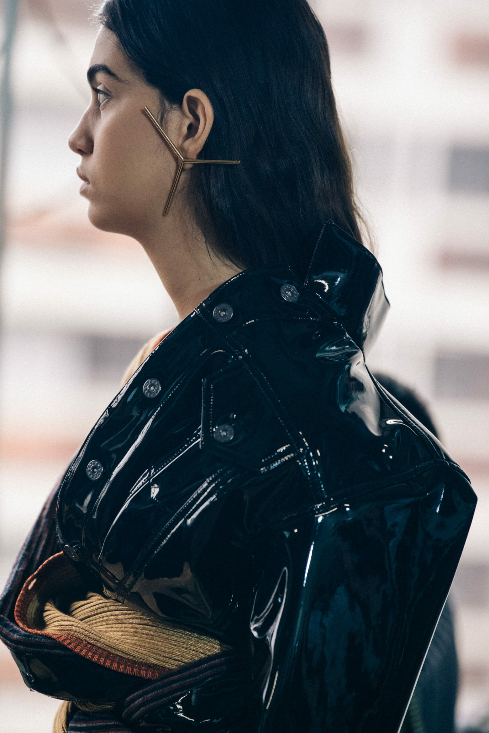 Models wearing large earrings at Y Project