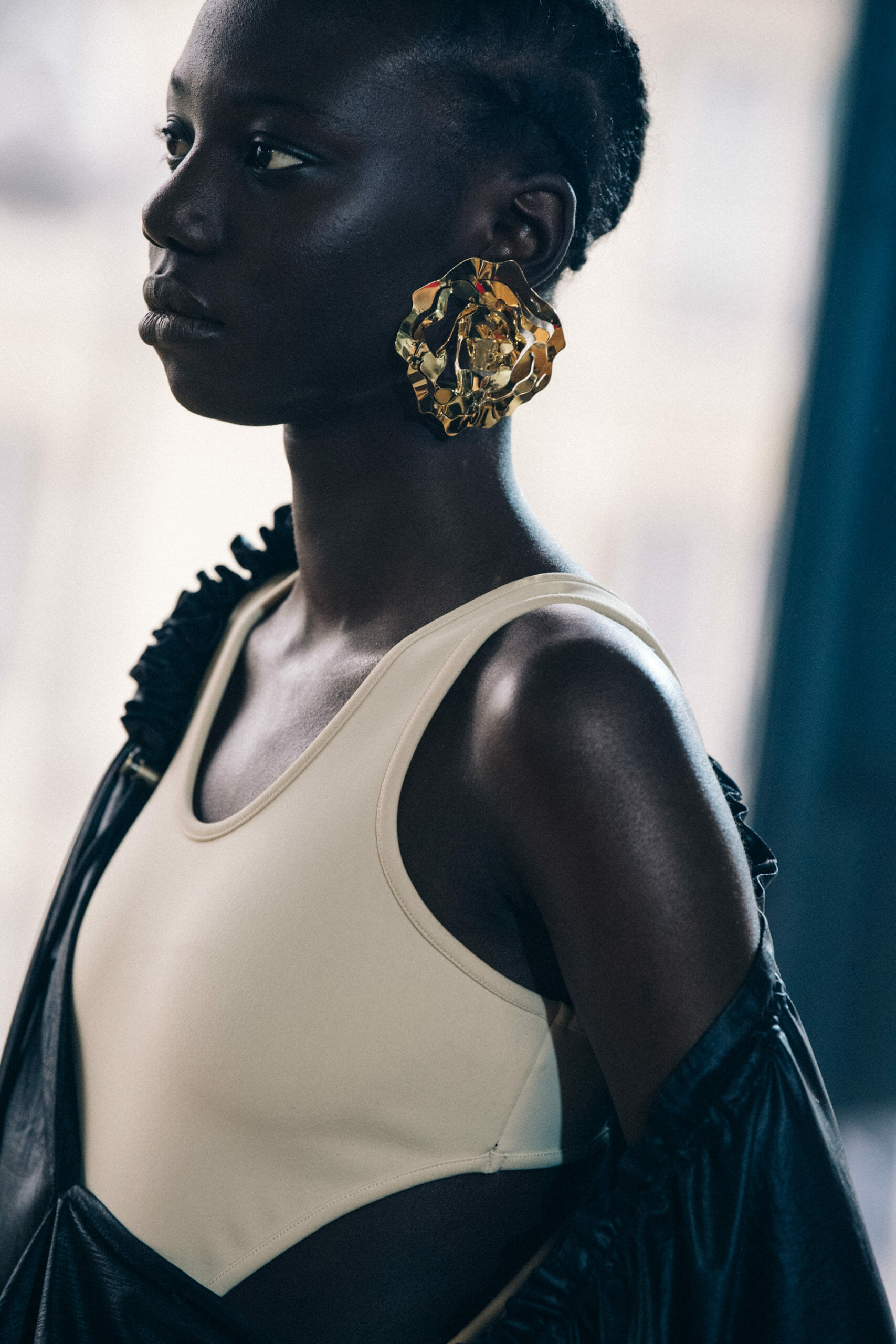 Models wearing large earrings at Y Project
