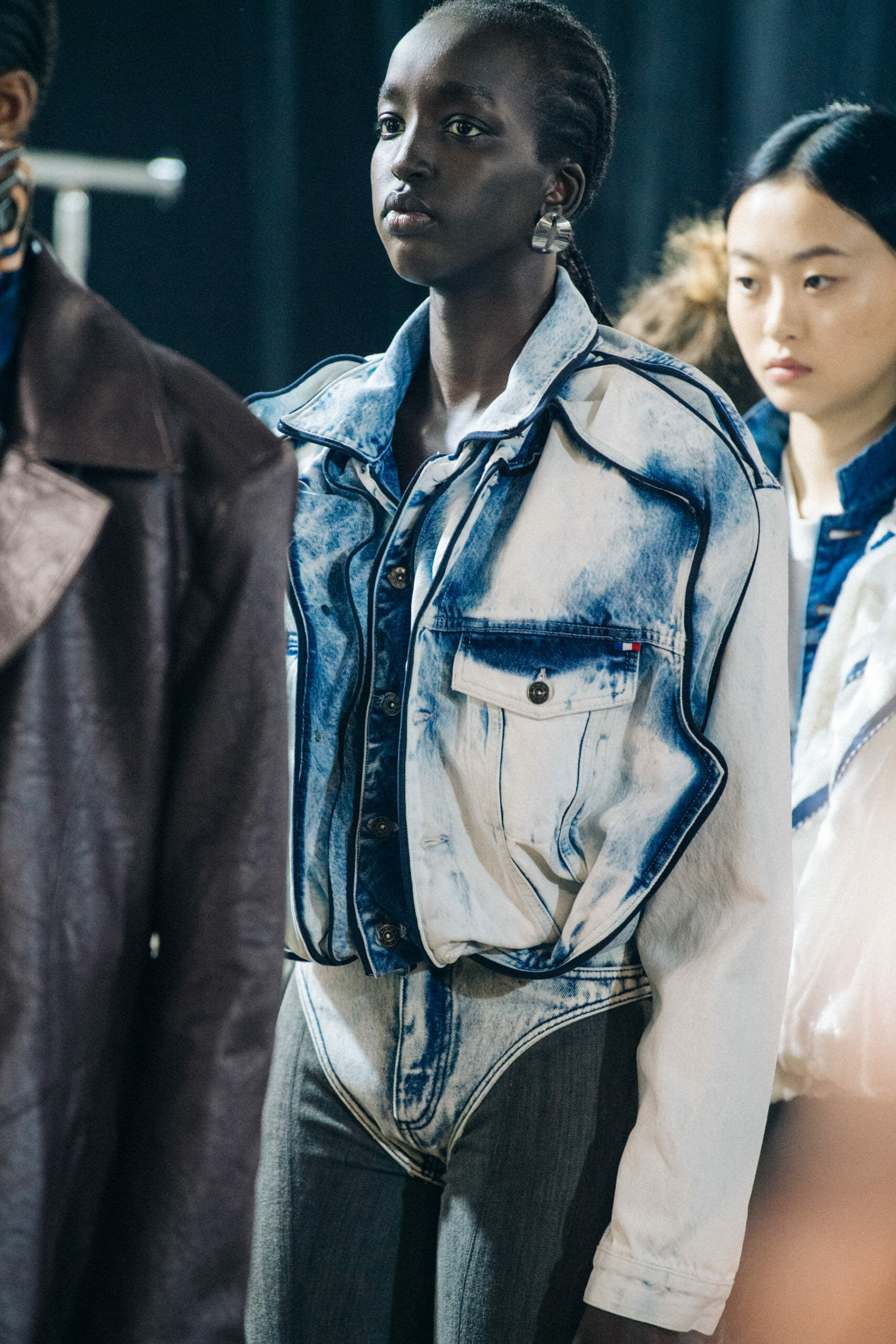 Models wearing large earrings at Y Project