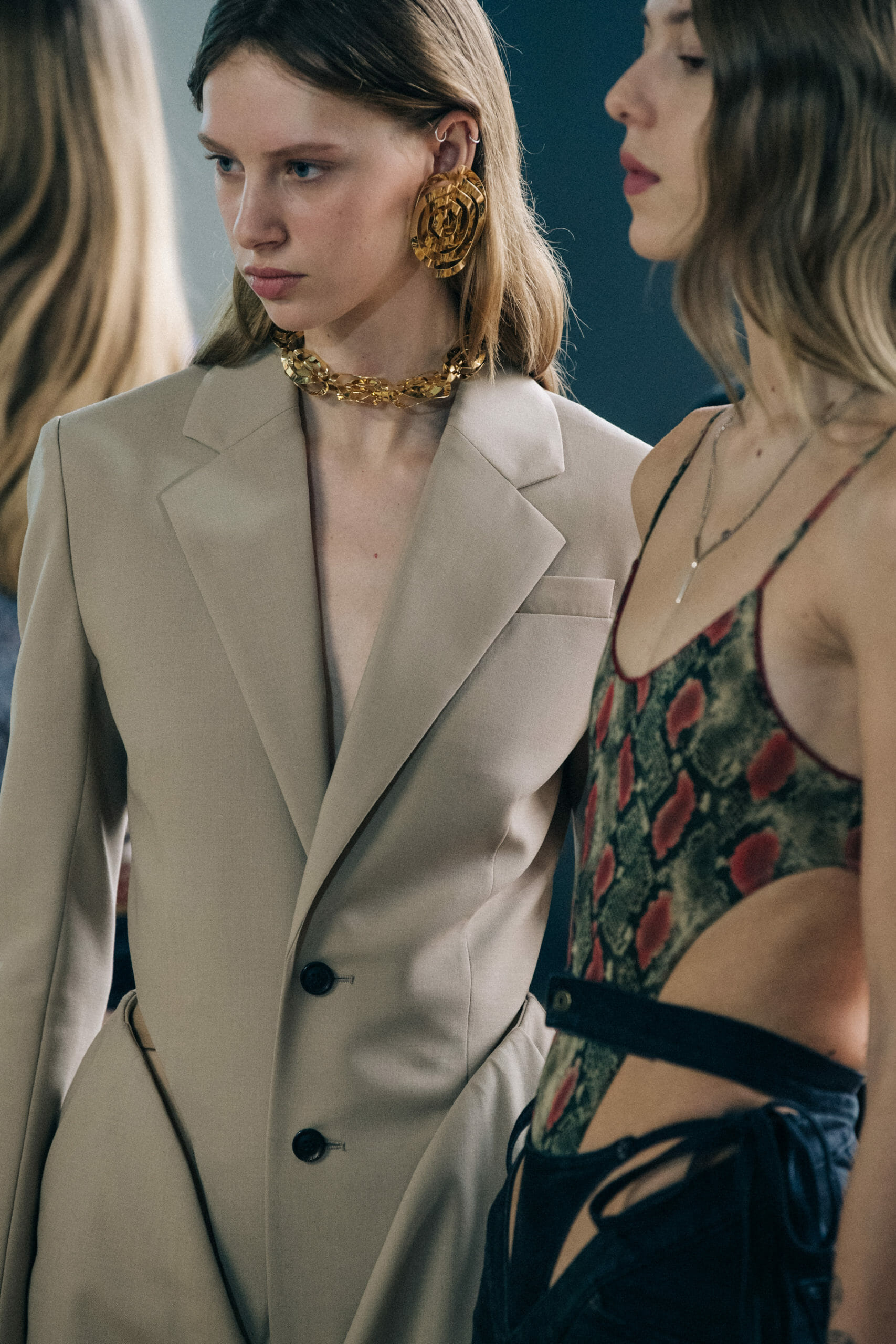 Models wearing large earrings at Y Project