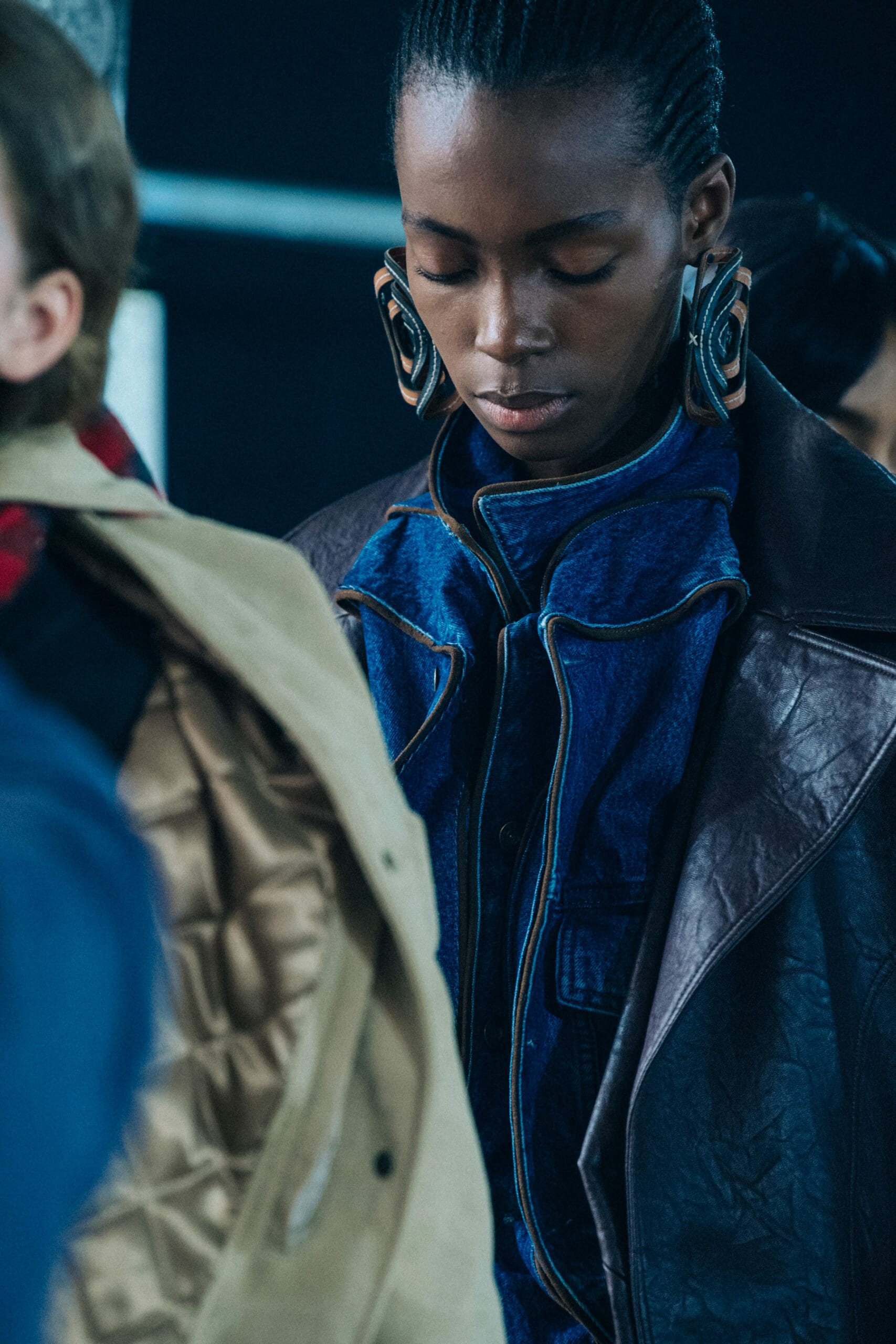 Models wearing large earrings at Y Project
