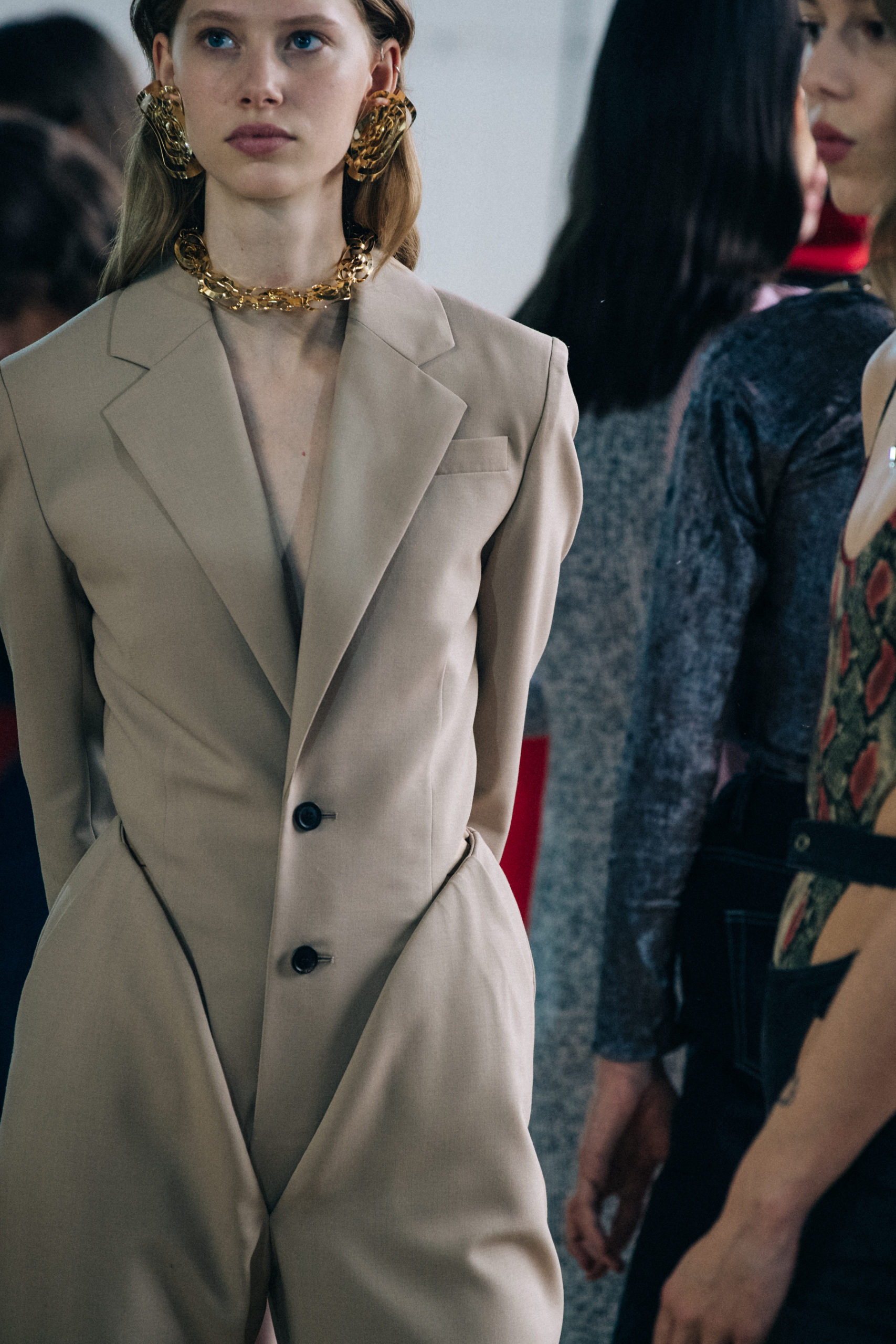 Models wearing large earrings at Y Project