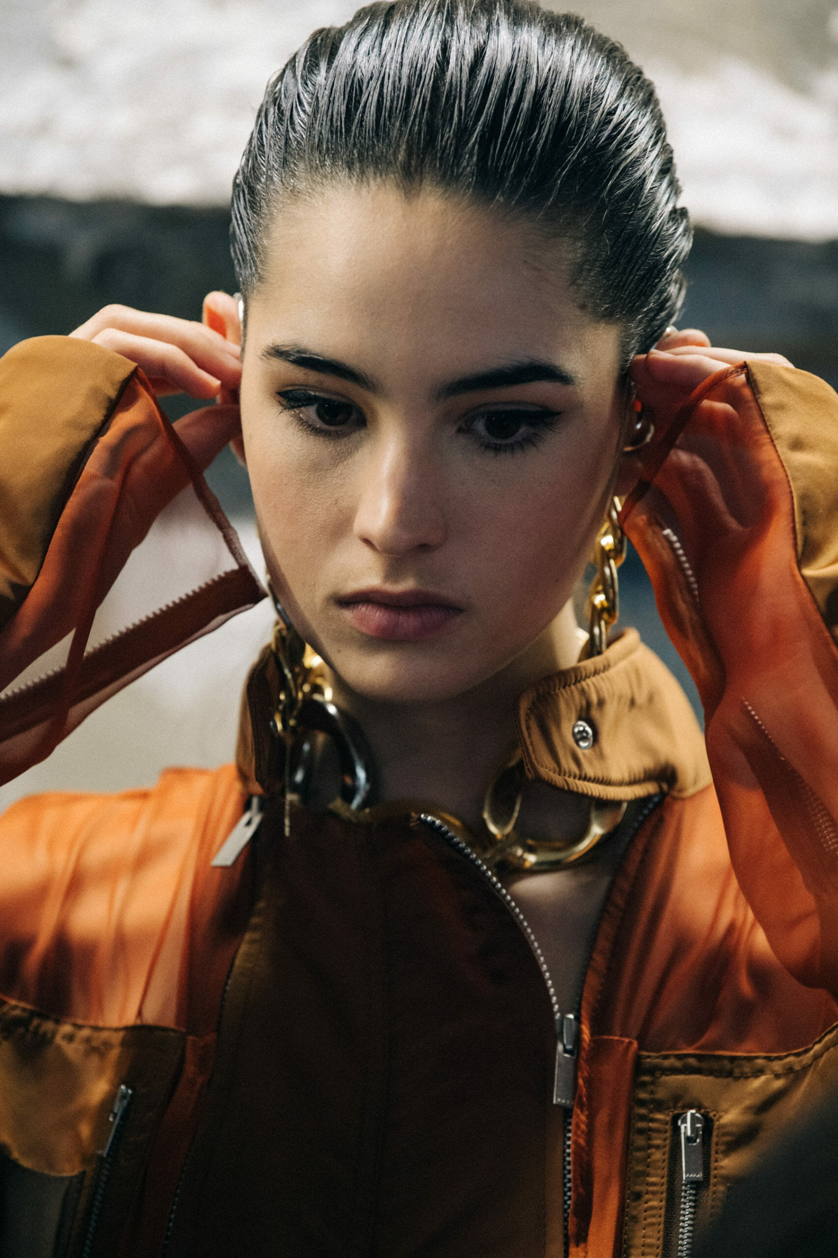 Model wearing brown at Sacai