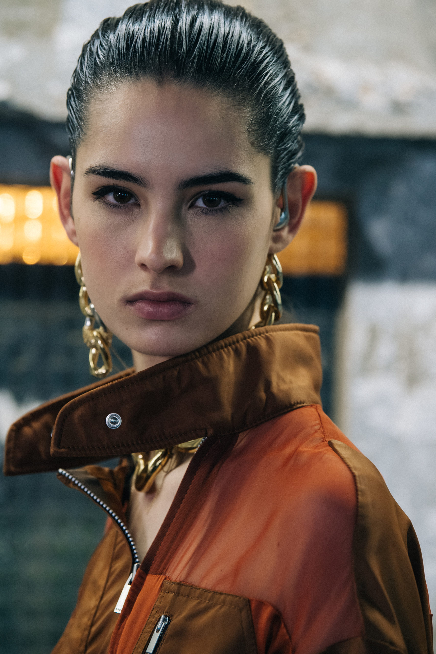 Model wearing brown at Sacai