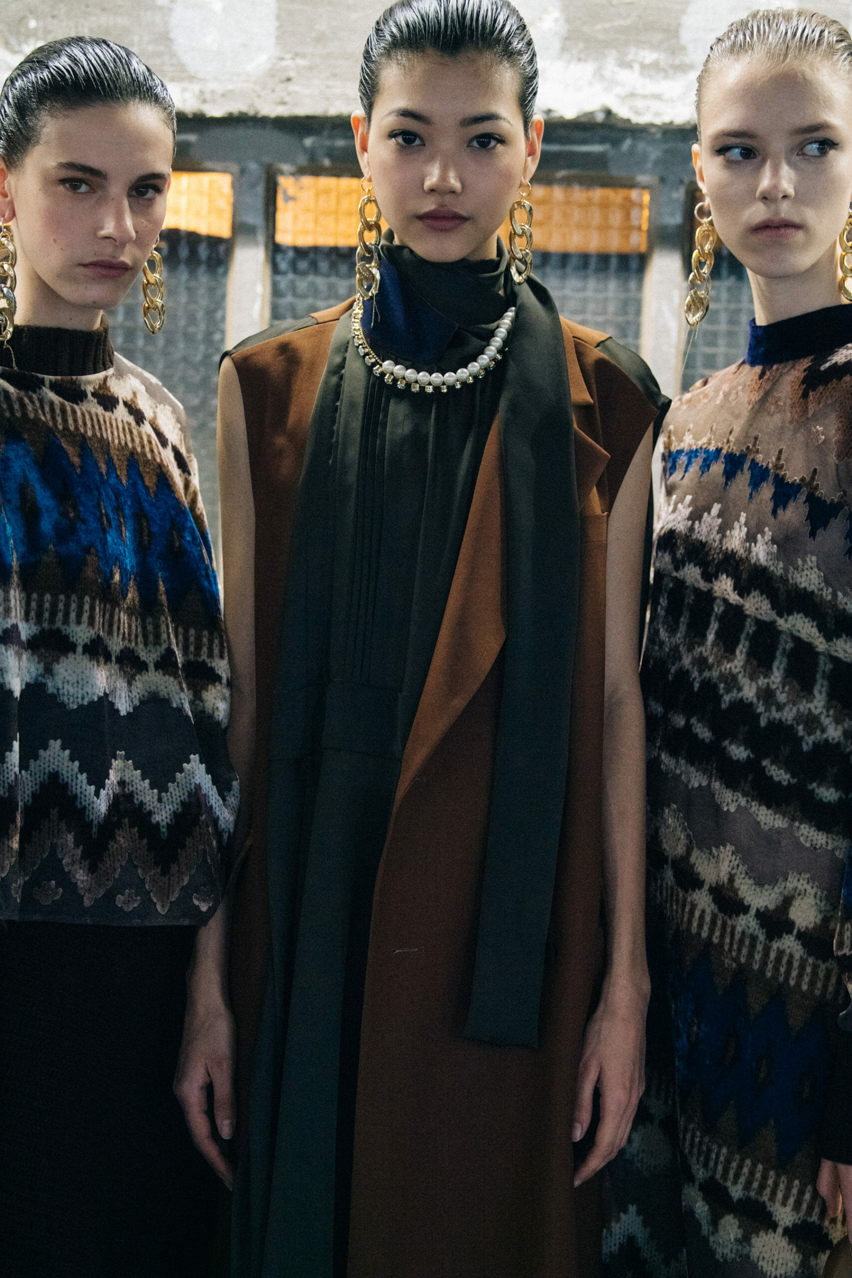 Model wearing brown at Sacai