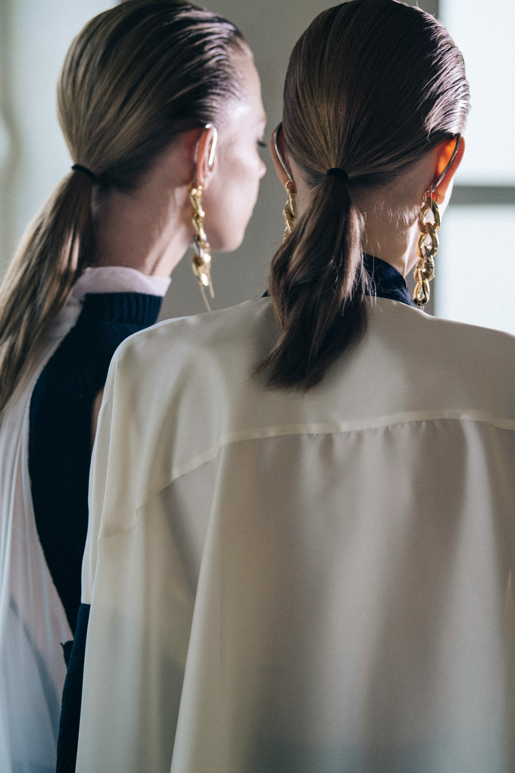 Model wearing white at Sacai