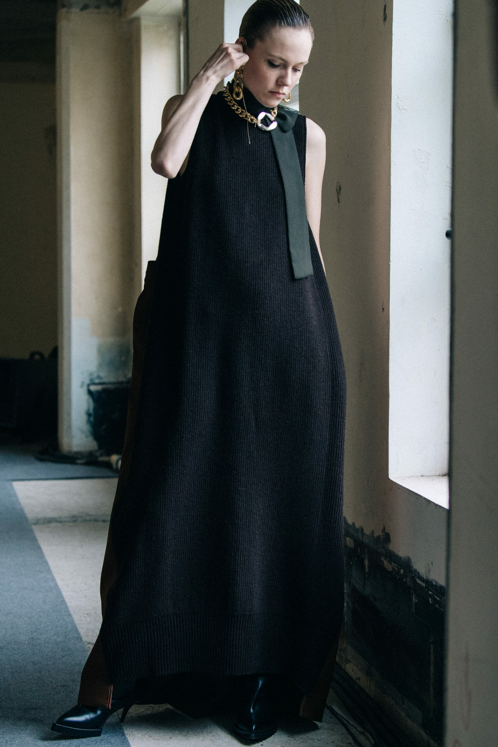 Model wearing black at Sacai