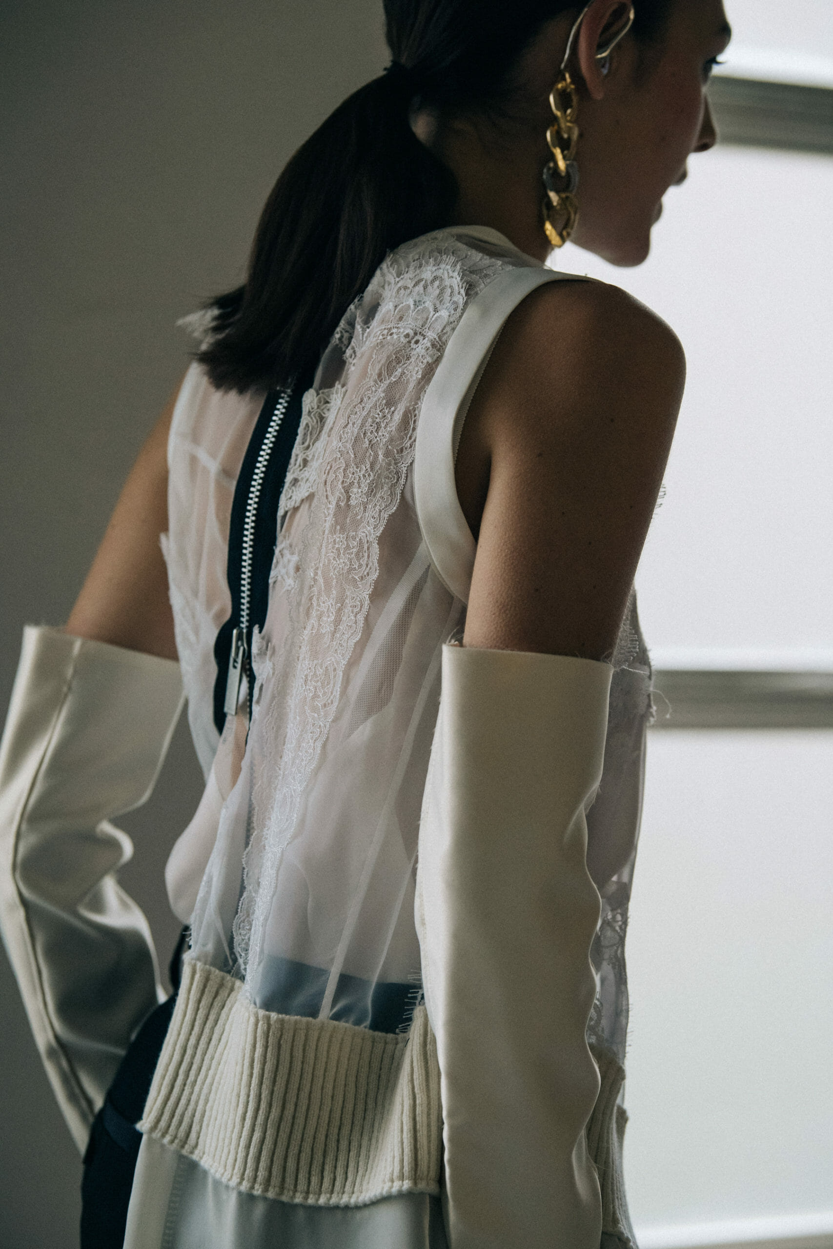 Model wearing white at Sacai