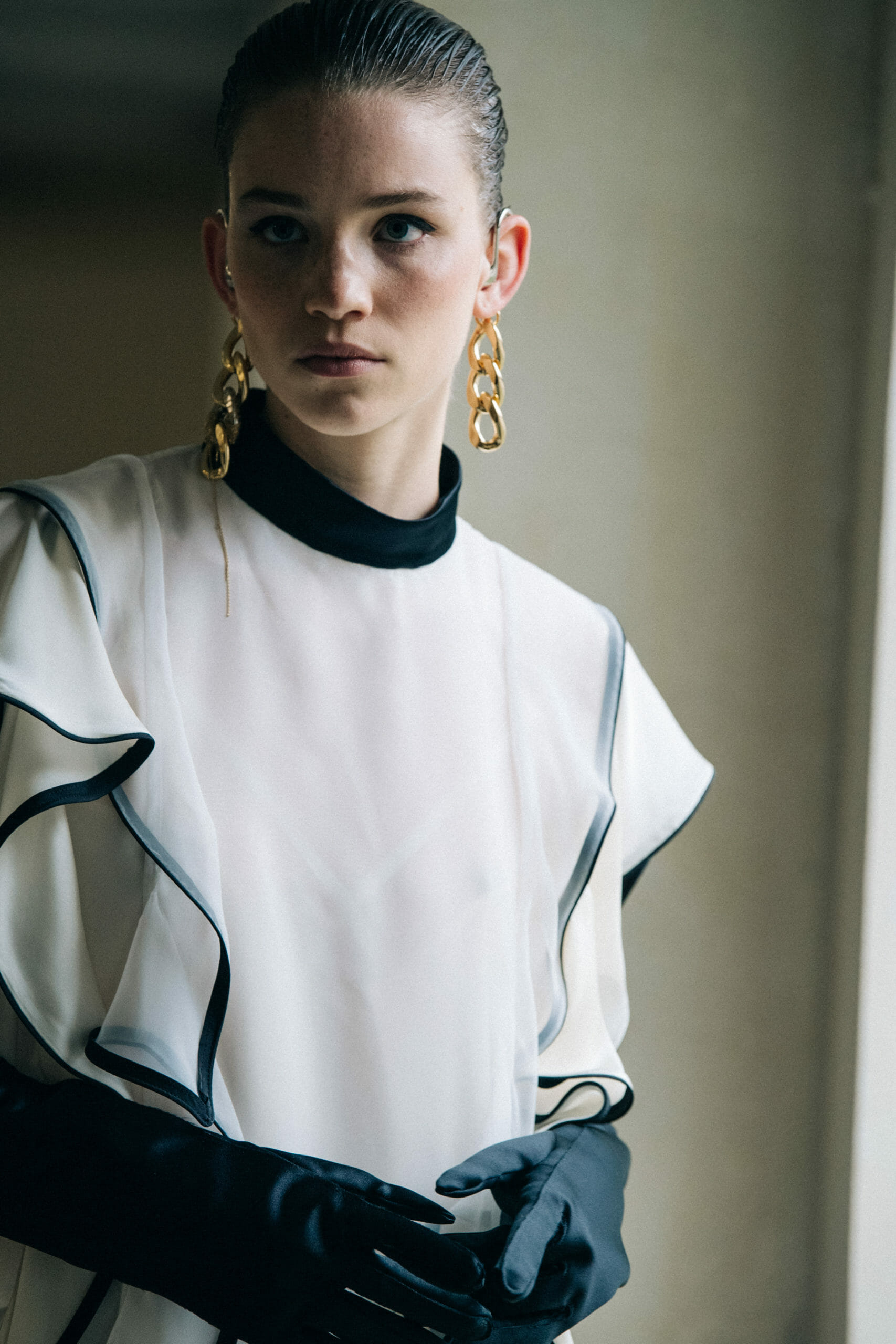 Model wearing white at Sacai