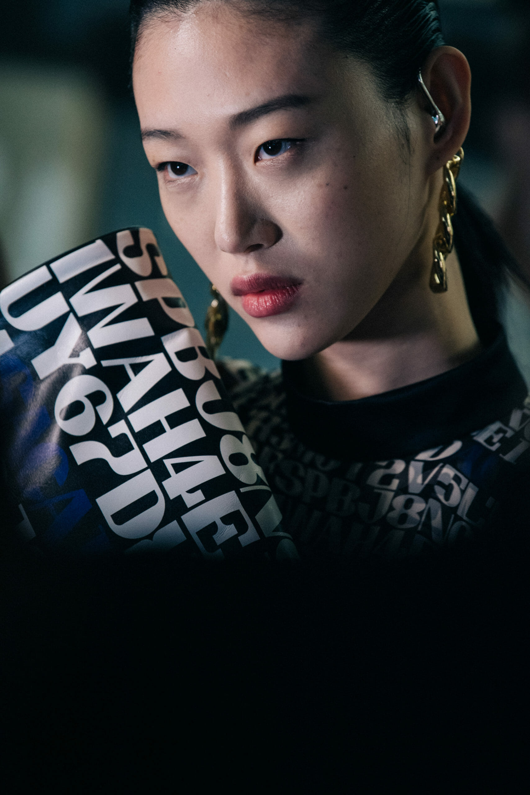 Model wearing black at Sacai