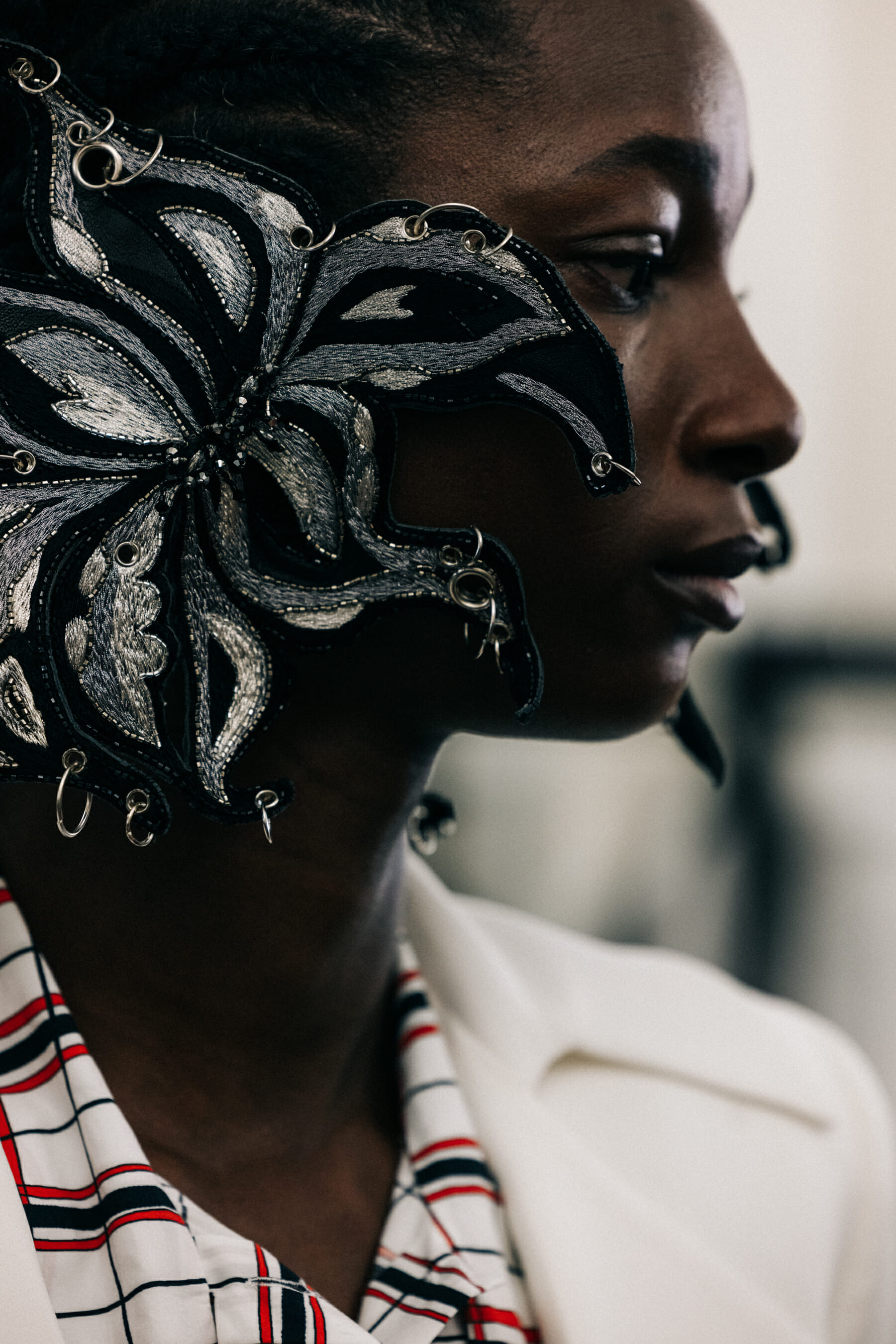 Model with large earring profile