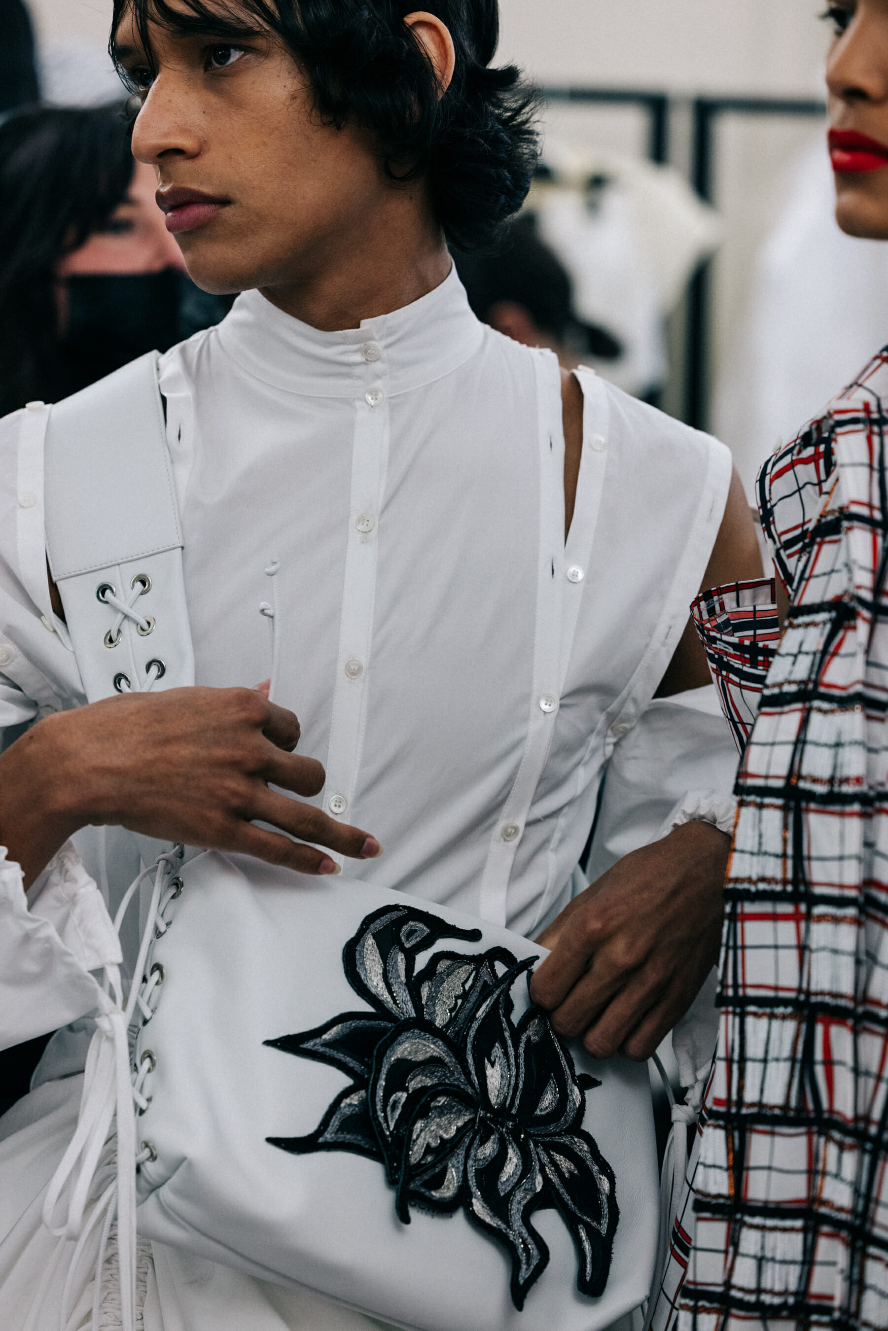 Model wearing white before show