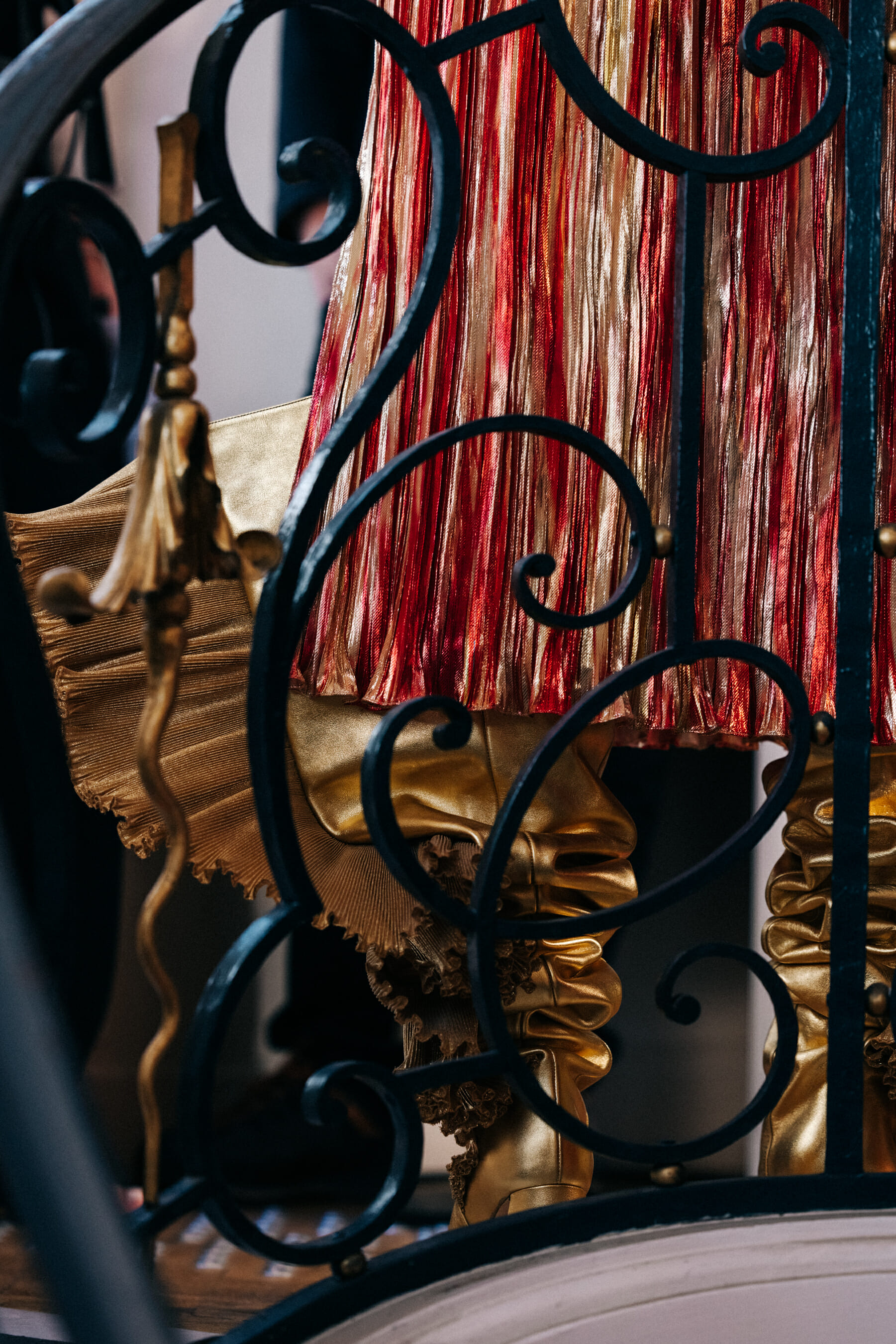 Detail of dress and gold boots
