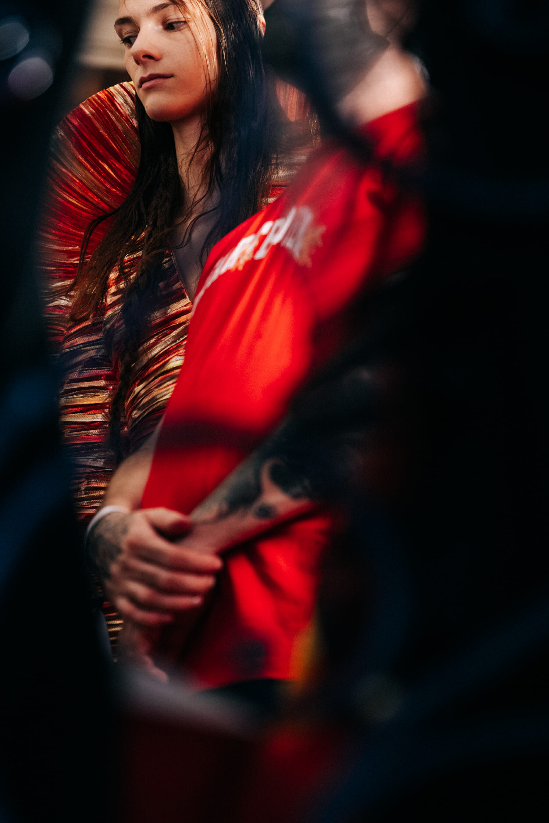 Model wearing metallic dress