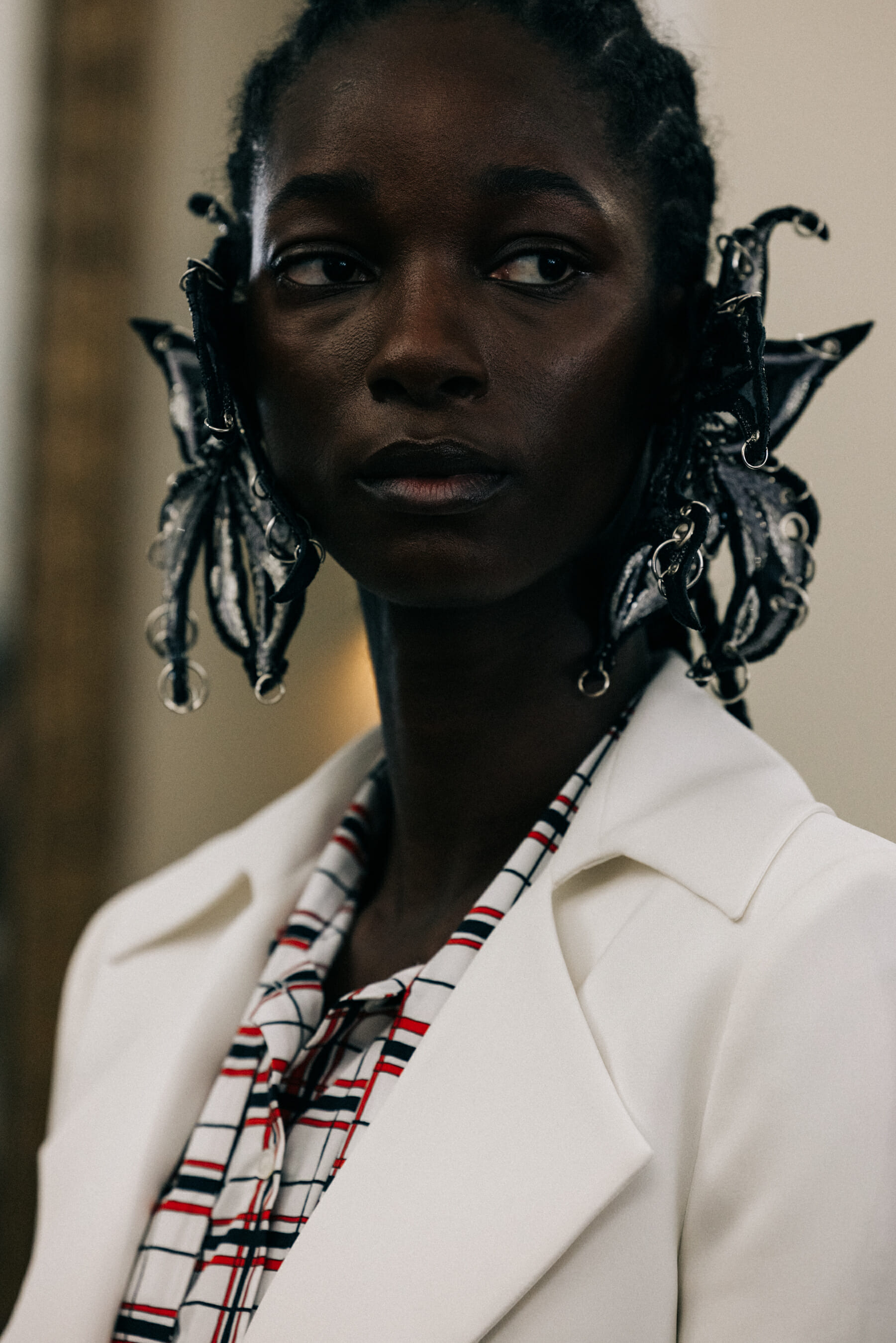 Model with large earrings